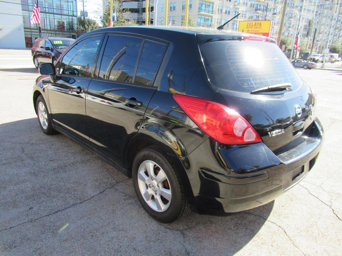 2012 Black /Black Nissan Versa 1.8 SL Hatchback (3N1BC1CP0CK) with an 1.8L L4 DOHC 16V engine, Continuously Variable Transmission transmission, located at 1511 North Shepherd Dr., Houston, TX, 77008, (281) 657-1221, 29.798361, -95.412560 - 2012 NISSAN VERSA 1.8 S VIN: 3N1BC1CP0CK257268 3 N 1 B C 1 C P 0 C K 2 5 7 2 6 8 HATCHBACK 4 DR 1.8L I4 F DOHC 16V GASOLINE FRONT WHEEL DRIVE - Photo#21