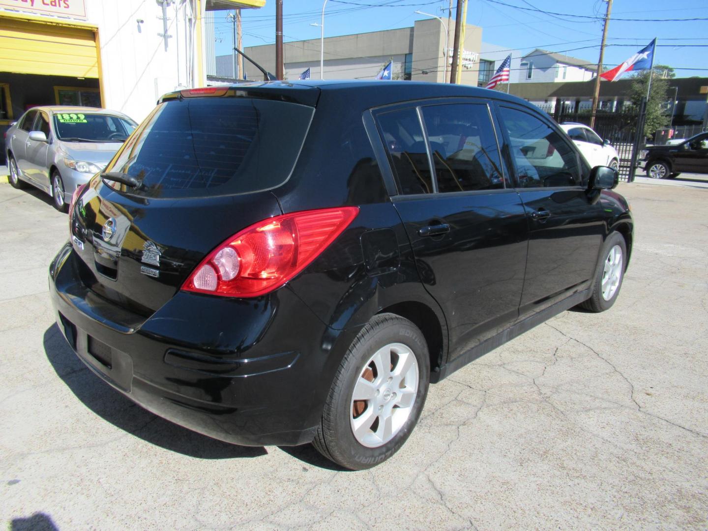 2012 Black /Black Nissan Versa 1.8 SL Hatchback (3N1BC1CP0CK) with an 1.8L L4 DOHC 16V engine, Continuously Variable Transmission transmission, located at 1511 North Shepherd Dr., Houston, TX, 77008, (281) 657-1221, 29.798361, -95.412560 - 2012 NISSAN VERSA 1.8 S VIN: 3N1BC1CP0CK257268 3 N 1 B C 1 C P 0 C K 2 5 7 2 6 8 HATCHBACK 4 DR 1.8L I4 F DOHC 16V GASOLINE FRONT WHEEL DRIVE - Photo#22
