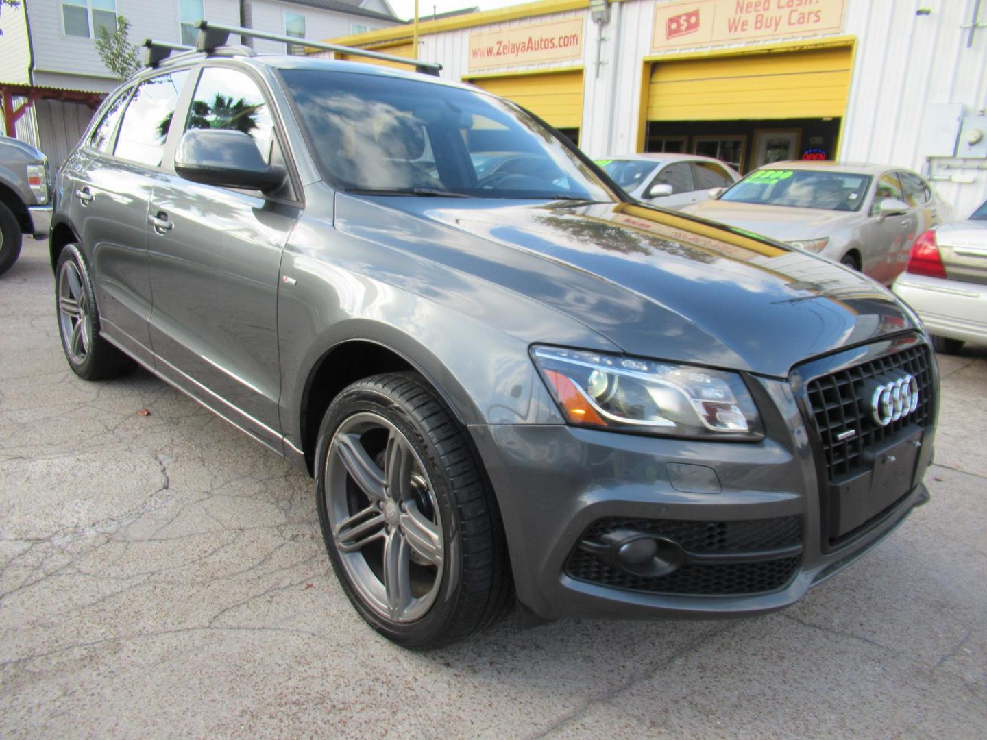 2012 Gray /Black Audi Q5 3.2 quattro Premium (WA1DKAFP8CA) with an 3.2L V6 DOHC 24V engine, 6-Speed Automatic transmission, located at 1511 North Shepherd Dr., Houston, TX, 77008, (281) 657-1221, 29.798361, -95.412560 - 2012 AUDI Q5 3.2 QUATTRO PREMIUM PLUS VIN: WA1DKAFP8CA121387 W A 1 D K A F P 8 C A 1 2 1 3 8 7 4 DOOR WAGON/SPORT UTILITY 3.2L V6 F DOHC 24V GASOLINE ALL WHEEL DRIVE - Photo#0