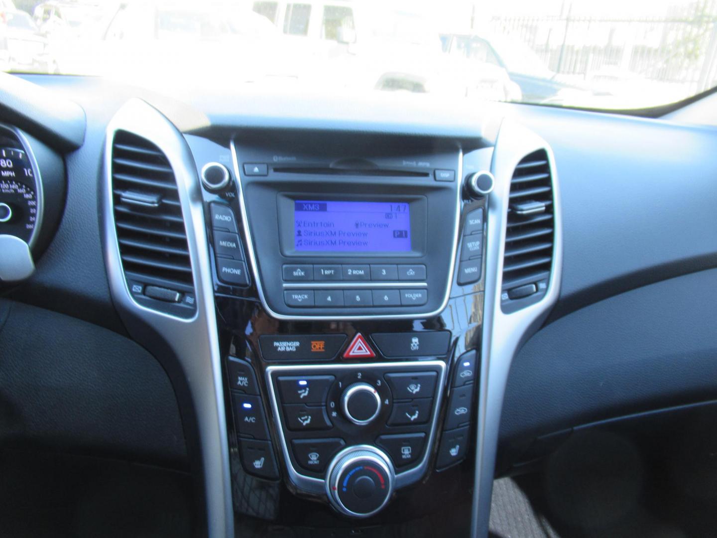 2013 Silver /Black Hyundai Elantra GT A/T (KMHD35LE8DU) with an 1.8L L4 16V DOHC engine, 6-Speed Automatic transmission, located at 1511 North Shepherd Dr., Houston, TX, 77008, (281) 657-1221, 29.798361, -95.412560 - 2013 HYUNDAI ELANTRA GT VIN: KMHD35LE8DU131541 K M H D 3 5 L E 8 D U 1 3 1 5 4 1 HATCHBACK 4 DR 1.8L I4 F DOHC 16V GASOLINE FRONT WHEEL DRIVE - Photo#2