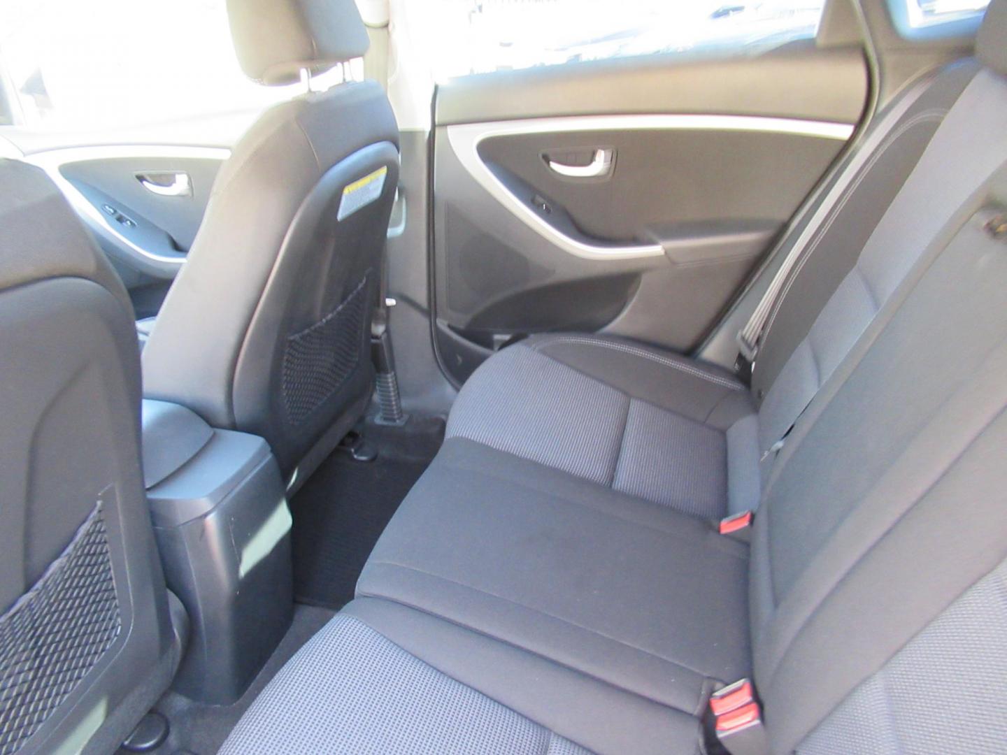 2013 Silver /Black Hyundai Elantra GT A/T (KMHD35LE8DU) with an 1.8L L4 16V DOHC engine, 6-Speed Automatic transmission, located at 1511 North Shepherd Dr., Houston, TX, 77008, (281) 657-1221, 29.798361, -95.412560 - 2013 HYUNDAI ELANTRA GT VIN: KMHD35LE8DU131541 K M H D 3 5 L E 8 D U 1 3 1 5 4 1 HATCHBACK 4 DR 1.8L I4 F DOHC 16V GASOLINE FRONT WHEEL DRIVE - Photo#8