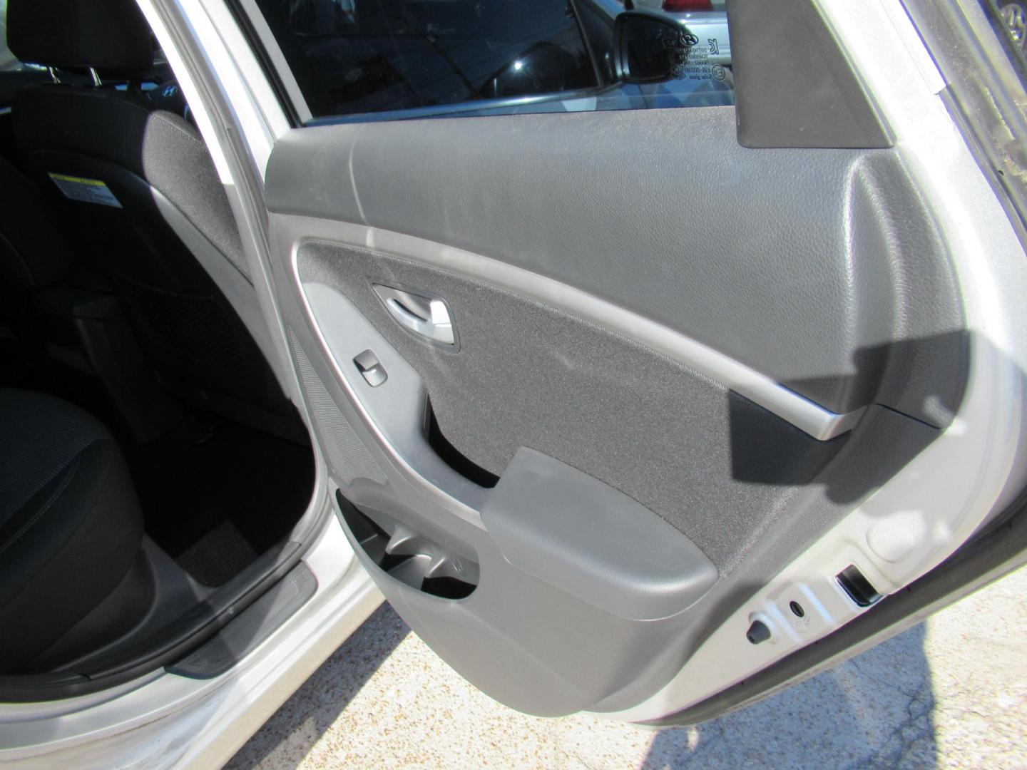 2013 Silver /Black Hyundai Elantra GT A/T (KMHD35LE8DU) with an 1.8L L4 16V DOHC engine, 6-Speed Automatic transmission, located at 1511 North Shepherd Dr., Houston, TX, 77008, (281) 657-1221, 29.798361, -95.412560 - 2013 HYUNDAI ELANTRA GT VIN: KMHD35LE8DU131541 K M H D 3 5 L E 8 D U 1 3 1 5 4 1 HATCHBACK 4 DR 1.8L I4 F DOHC 16V GASOLINE FRONT WHEEL DRIVE - Photo#12