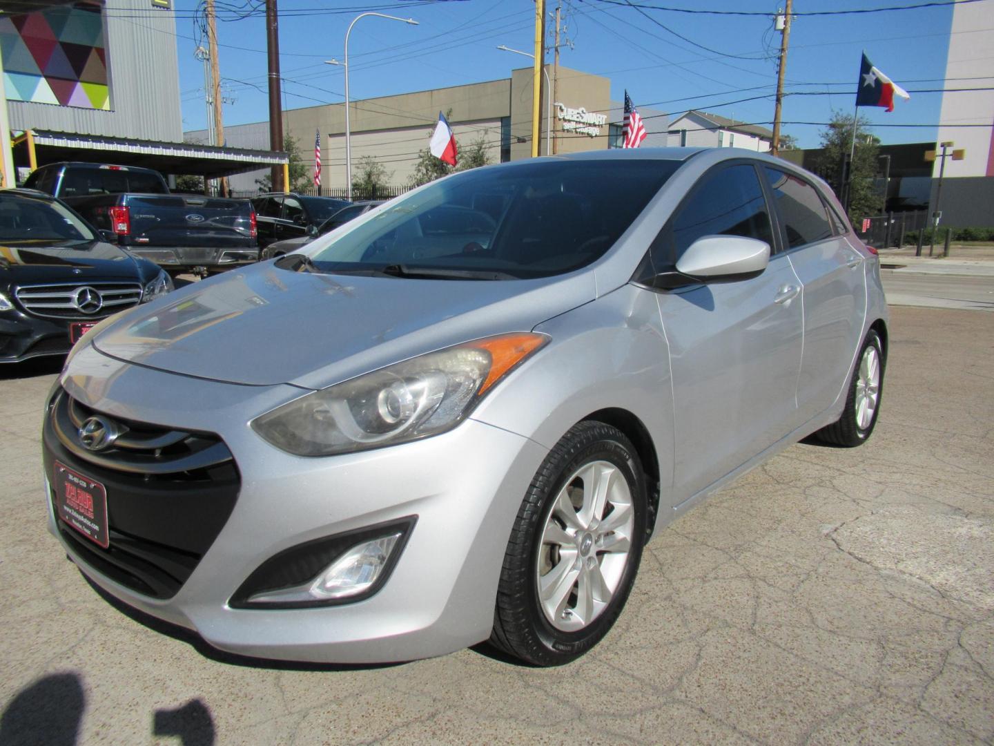 2013 Silver /Black Hyundai Elantra GT A/T (KMHD35LE8DU) with an 1.8L L4 16V DOHC engine, 6-Speed Automatic transmission, located at 1511 North Shepherd Dr., Houston, TX, 77008, (281) 657-1221, 29.798361, -95.412560 - 2013 HYUNDAI ELANTRA GT VIN: KMHD35LE8DU131541 K M H D 3 5 L E 8 D U 1 3 1 5 4 1 HATCHBACK 4 DR 1.8L I4 F DOHC 16V GASOLINE FRONT WHEEL DRIVE - Photo#16