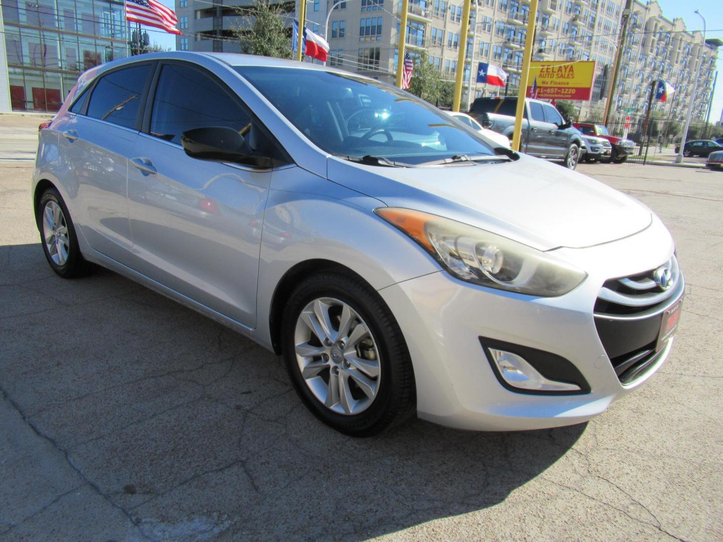 2013 Silver /Black Hyundai Elantra GT A/T (KMHD35LE8DU) with an 1.8L L4 16V DOHC engine, 6-Speed Automatic transmission, located at 1511 North Shepherd Dr., Houston, TX, 77008, (281) 657-1221, 29.798361, -95.412560 - 2013 HYUNDAI ELANTRA GT VIN: KMHD35LE8DU131541 K M H D 3 5 L E 8 D U 1 3 1 5 4 1 HATCHBACK 4 DR 1.8L I4 F DOHC 16V GASOLINE FRONT WHEEL DRIVE - Photo#20
