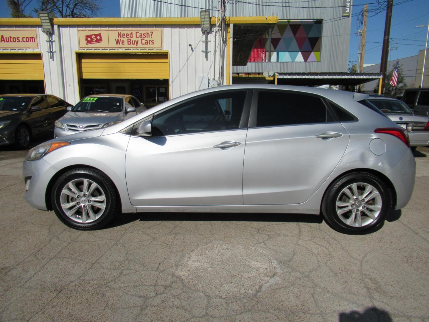 2013 Silver /Black Hyundai Elantra GT A/T (KMHD35LE8DU) with an 1.8L L4 16V DOHC engine, 6-Speed Automatic transmission, located at 1511 North Shepherd Dr., Houston, TX, 77008, (281) 657-1221, 29.798361, -95.412560 - 2013 HYUNDAI ELANTRA GT VIN: KMHD35LE8DU131541 K M H D 3 5 L E 8 D U 1 3 1 5 4 1 HATCHBACK 4 DR 1.8L I4 F DOHC 16V GASOLINE FRONT WHEEL DRIVE - Photo#17