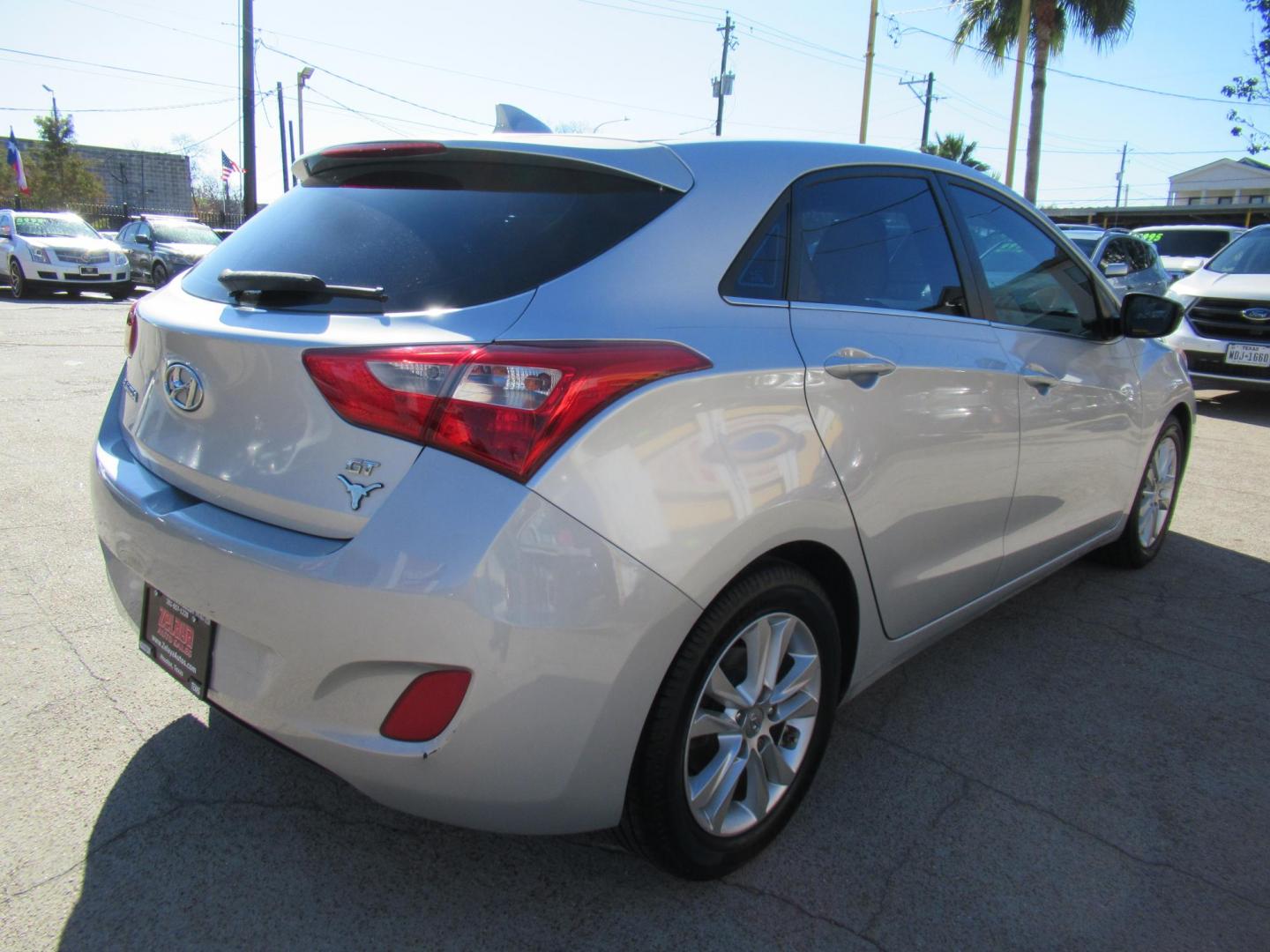 2013 Silver /Black Hyundai Elantra GT A/T (KMHD35LE8DU) with an 1.8L L4 16V DOHC engine, 6-Speed Automatic transmission, located at 1511 North Shepherd Dr., Houston, TX, 77008, (281) 657-1221, 29.798361, -95.412560 - 2013 HYUNDAI ELANTRA GT VIN: KMHD35LE8DU131541 K M H D 3 5 L E 8 D U 1 3 1 5 4 1 HATCHBACK 4 DR 1.8L I4 F DOHC 16V GASOLINE FRONT WHEEL DRIVE - Photo#21