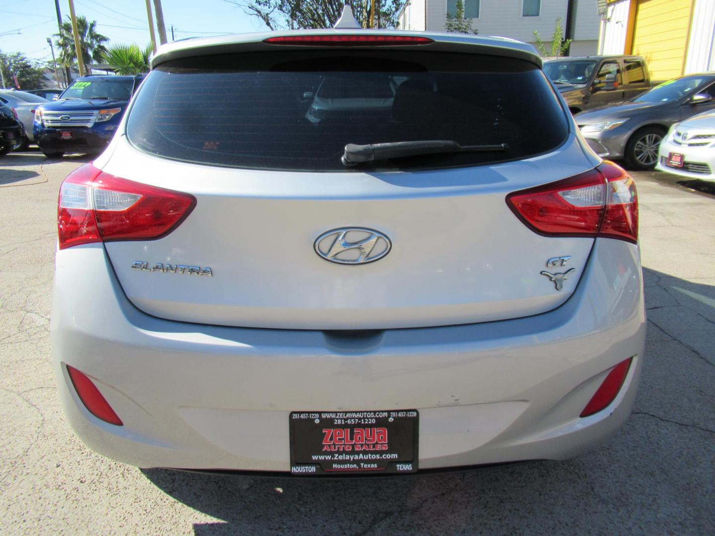 2013 Silver /Black Hyundai Elantra GT A/T (KMHD35LE8DU) with an 1.8L L4 16V DOHC engine, 6-Speed Automatic transmission, located at 1511 North Shepherd Dr., Houston, TX, 77008, (281) 657-1221, 29.798361, -95.412560 - 2013 HYUNDAI ELANTRA GT VIN: KMHD35LE8DU131541 K M H D 3 5 L E 8 D U 1 3 1 5 4 1 HATCHBACK 4 DR 1.8L I4 F DOHC 16V GASOLINE FRONT WHEEL DRIVE - Photo#22