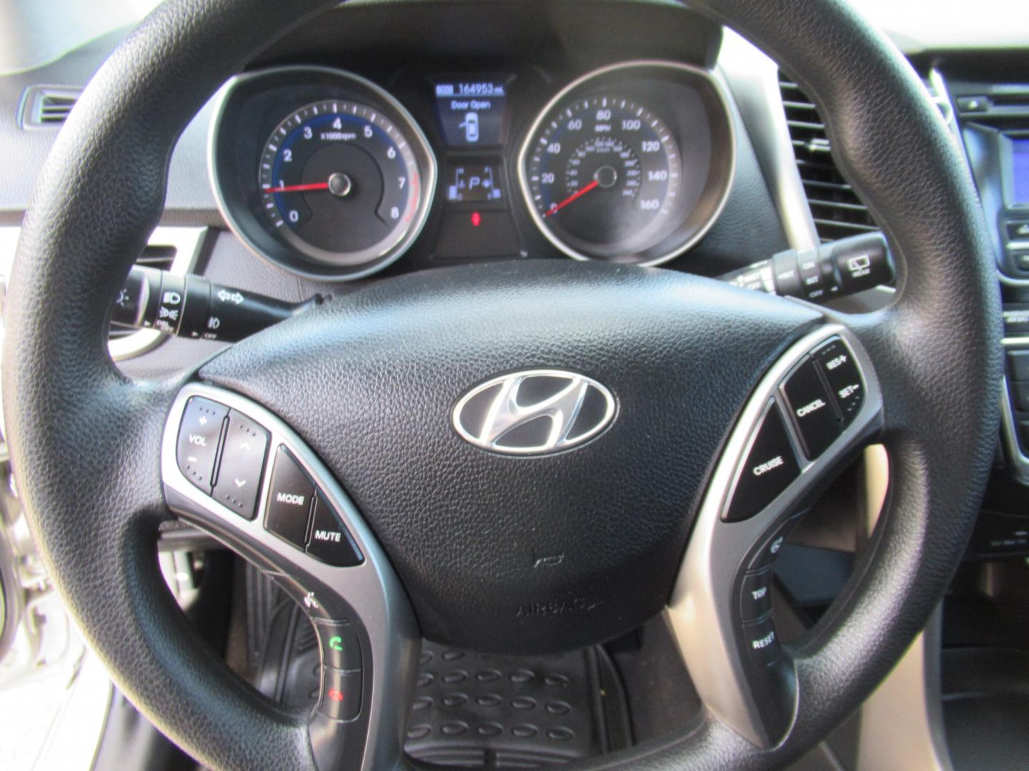 2013 Silver /Black Hyundai Elantra GT A/T (KMHD35LE8DU) with an 1.8L L4 16V DOHC engine, 6-Speed Automatic transmission, located at 1511 North Shepherd Dr., Houston, TX, 77008, (281) 657-1221, 29.798361, -95.412560 - 2013 HYUNDAI ELANTRA GT VIN: KMHD35LE8DU131541 K M H D 3 5 L E 8 D U 1 3 1 5 4 1 HATCHBACK 4 DR 1.8L I4 F DOHC 16V GASOLINE FRONT WHEEL DRIVE- Photo#22