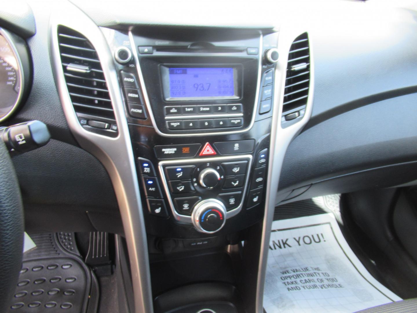 2013 Silver /Black Hyundai Elantra GT A/T (KMHD35LE8DU) with an 1.8L L4 16V DOHC engine, 6-Speed Automatic transmission, located at 1511 North Shepherd Dr., Houston, TX, 77008, (281) 657-1221, 29.798361, -95.412560 - 2013 HYUNDAI ELANTRA GT VIN: KMHD35LE8DU131541 K M H D 3 5 L E 8 D U 1 3 1 5 4 1 HATCHBACK 4 DR 1.8L I4 F DOHC 16V GASOLINE FRONT WHEEL DRIVE- Photo#23