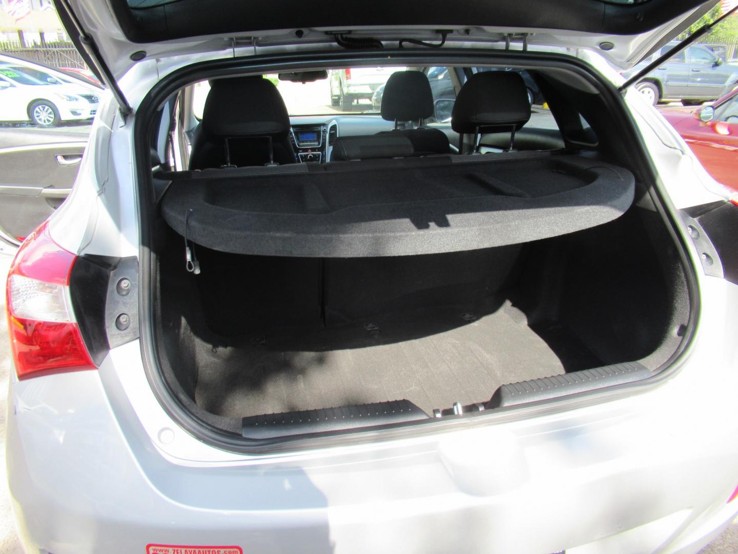 2013 Silver /Black Hyundai Elantra GT A/T (KMHD35LE8DU) with an 1.8L L4 16V DOHC engine, 6-Speed Automatic transmission, located at 1511 North Shepherd Dr., Houston, TX, 77008, (281) 657-1221, 29.798361, -95.412560 - 2013 HYUNDAI ELANTRA GT VIN: KMHD35LE8DU131541 K M H D 3 5 L E 8 D U 1 3 1 5 4 1 HATCHBACK 4 DR 1.8L I4 F DOHC 16V GASOLINE FRONT WHEEL DRIVE- Photo#24