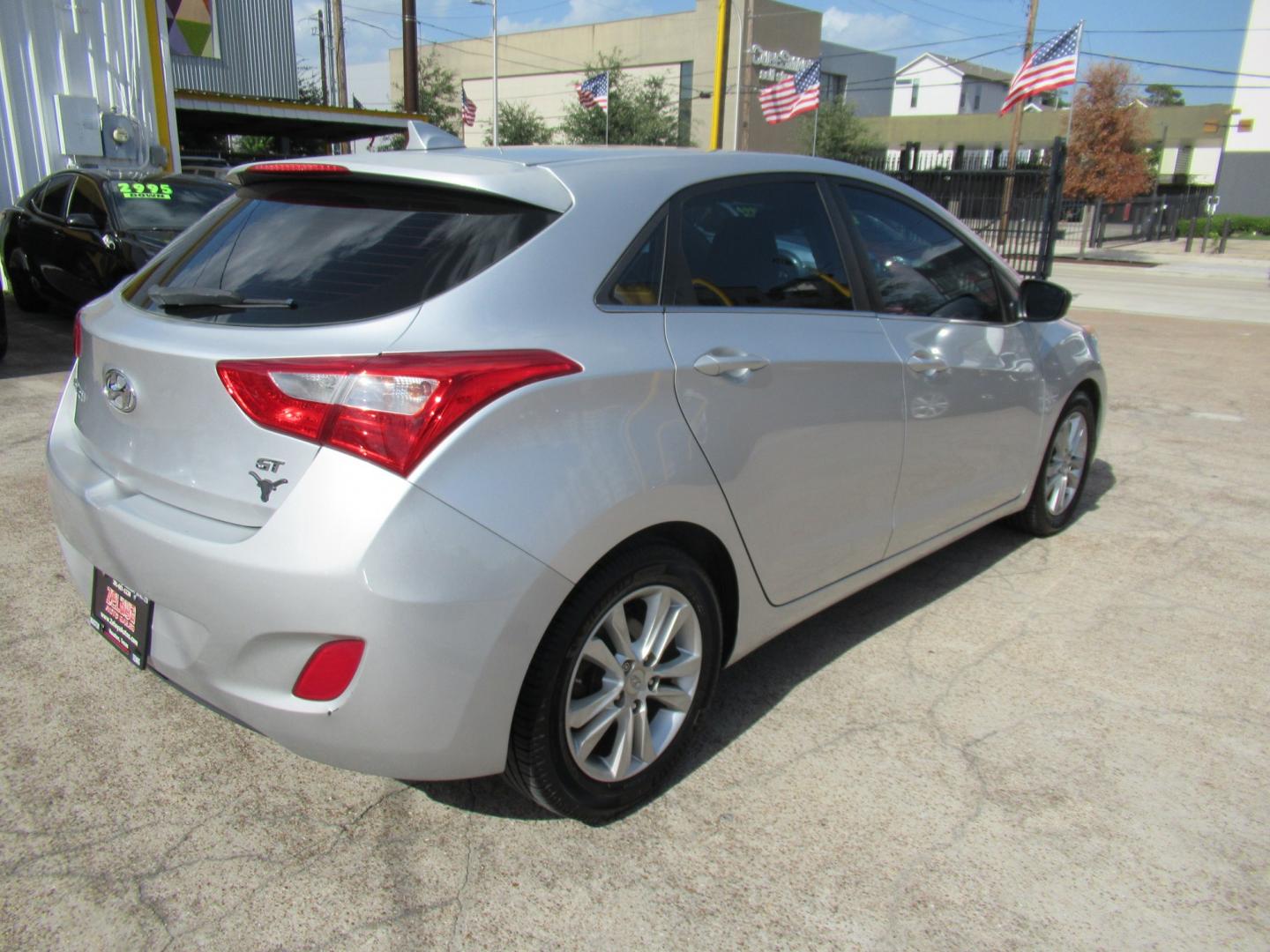 2013 Silver /Black Hyundai Elantra GT A/T (KMHD35LE8DU) with an 1.8L L4 16V DOHC engine, 6-Speed Automatic transmission, located at 1511 North Shepherd Dr., Houston, TX, 77008, (281) 657-1221, 29.798361, -95.412560 - 2013 HYUNDAI ELANTRA GT VIN: KMHD35LE8DU131541 K M H D 3 5 L E 8 D U 1 3 1 5 4 1 HATCHBACK 4 DR 1.8L I4 F DOHC 16V GASOLINE FRONT WHEEL DRIVE- Photo#27