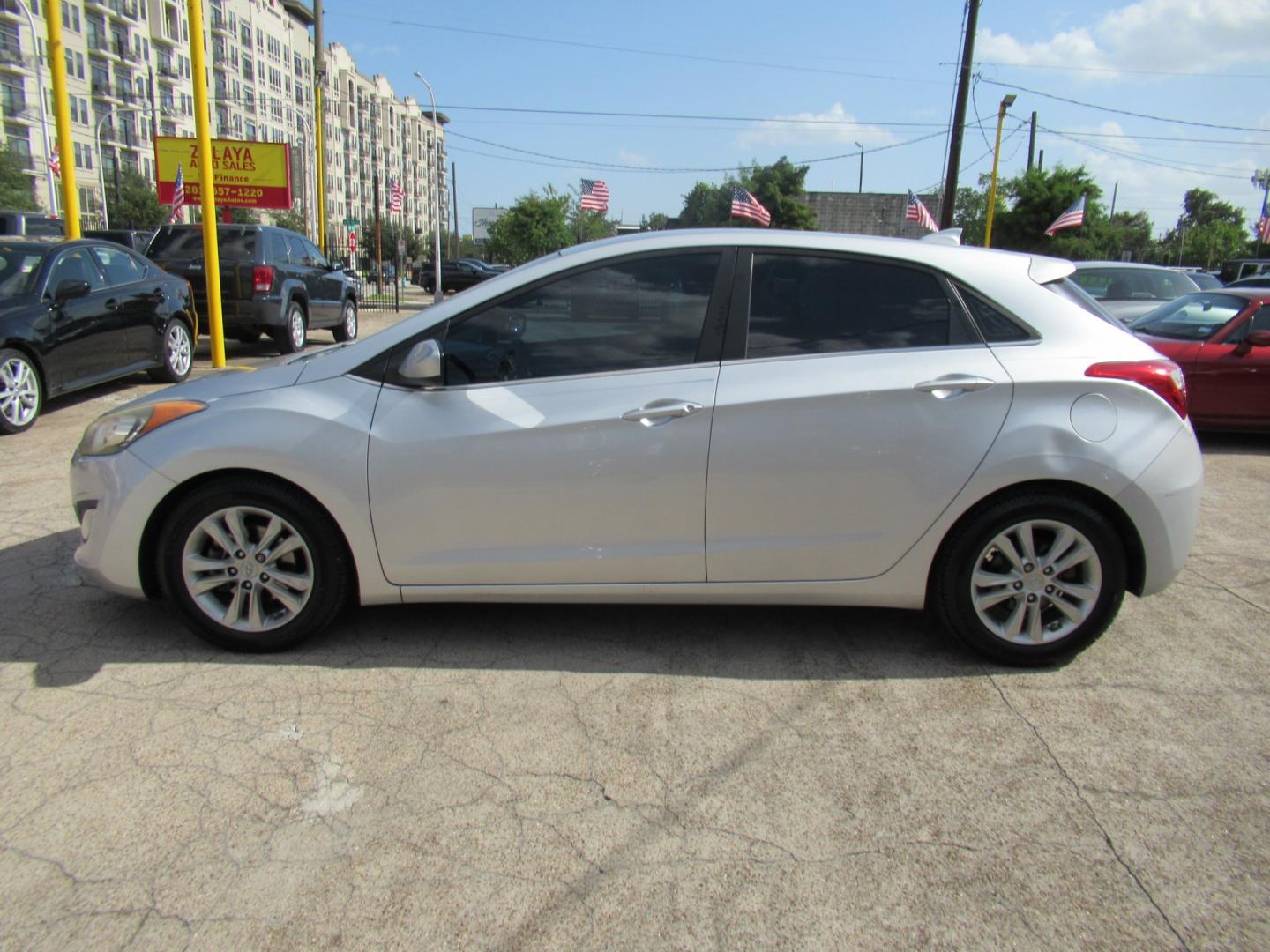 2013 Silver /Black Hyundai Elantra GT A/T (KMHD35LE8DU) with an 1.8L L4 16V DOHC engine, 6-Speed Automatic transmission, located at 1511 North Shepherd Dr., Houston, TX, 77008, (281) 657-1221, 29.798361, -95.412560 - 2013 HYUNDAI ELANTRA GT VIN: KMHD35LE8DU131541 K M H D 3 5 L E 8 D U 1 3 1 5 4 1 HATCHBACK 4 DR 1.8L I4 F DOHC 16V GASOLINE FRONT WHEEL DRIVE- Photo#29