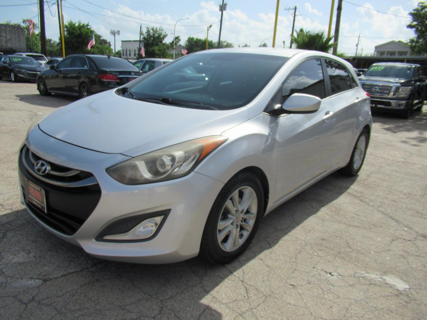2013 Silver /Black Hyundai Elantra GT A/T (KMHD35LE8DU) with an 1.8L L4 16V DOHC engine, 6-Speed Automatic transmission, located at 1511 North Shepherd Dr., Houston, TX, 77008, (281) 657-1221, 29.798361, -95.412560 - 2013 HYUNDAI ELANTRA GT VIN: KMHD35LE8DU131541 K M H D 3 5 L E 8 D U 1 3 1 5 4 1 HATCHBACK 4 DR 1.8L I4 F DOHC 16V GASOLINE FRONT WHEEL DRIVE- Photo#30