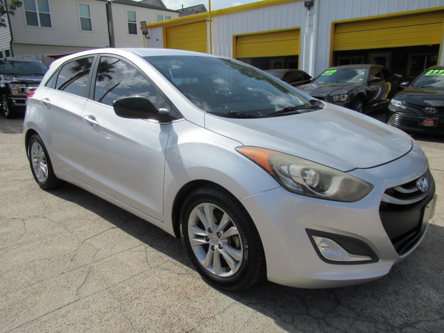 2013 Silver /Black Hyundai Elantra GT A/T (KMHD35LE8DU) with an 1.8L L4 16V DOHC engine, 6-Speed Automatic transmission, located at 1511 North Shepherd Dr., Houston, TX, 77008, (281) 657-1221, 29.798361, -95.412560 - 2013 HYUNDAI ELANTRA GT VIN: KMHD35LE8DU131541 K M H D 3 5 L E 8 D U 1 3 1 5 4 1 HATCHBACK 4 DR 1.8L I4 F DOHC 16V GASOLINE FRONT WHEEL DRIVE- Photo#31