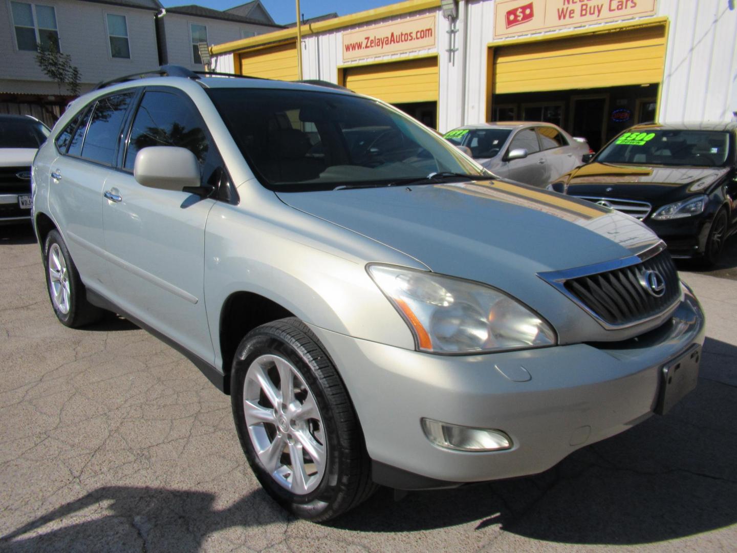 2009 Gold /Tan Lexus RX 350 FWD (2T2GK31U79C) with an 3.5L V6 DOHC 24V engine, 5-Speed Automatic Overdrive transmission, located at 1511 North Shepherd Dr., Houston, TX, 77008, (281) 657-1221, 29.798361, -95.412560 - 2009 LEXUS RX 350 VIN: 2T2GK31U79C066748 2 T 2 G K 3 1 U 7 9 C 0 6 6 7 4 8 4 DOOR WAGON/SPORT UTILITY 3.5L V6 F DOHC 24V GASOLINE FRONT WHEEL DRIVE - Photo#23