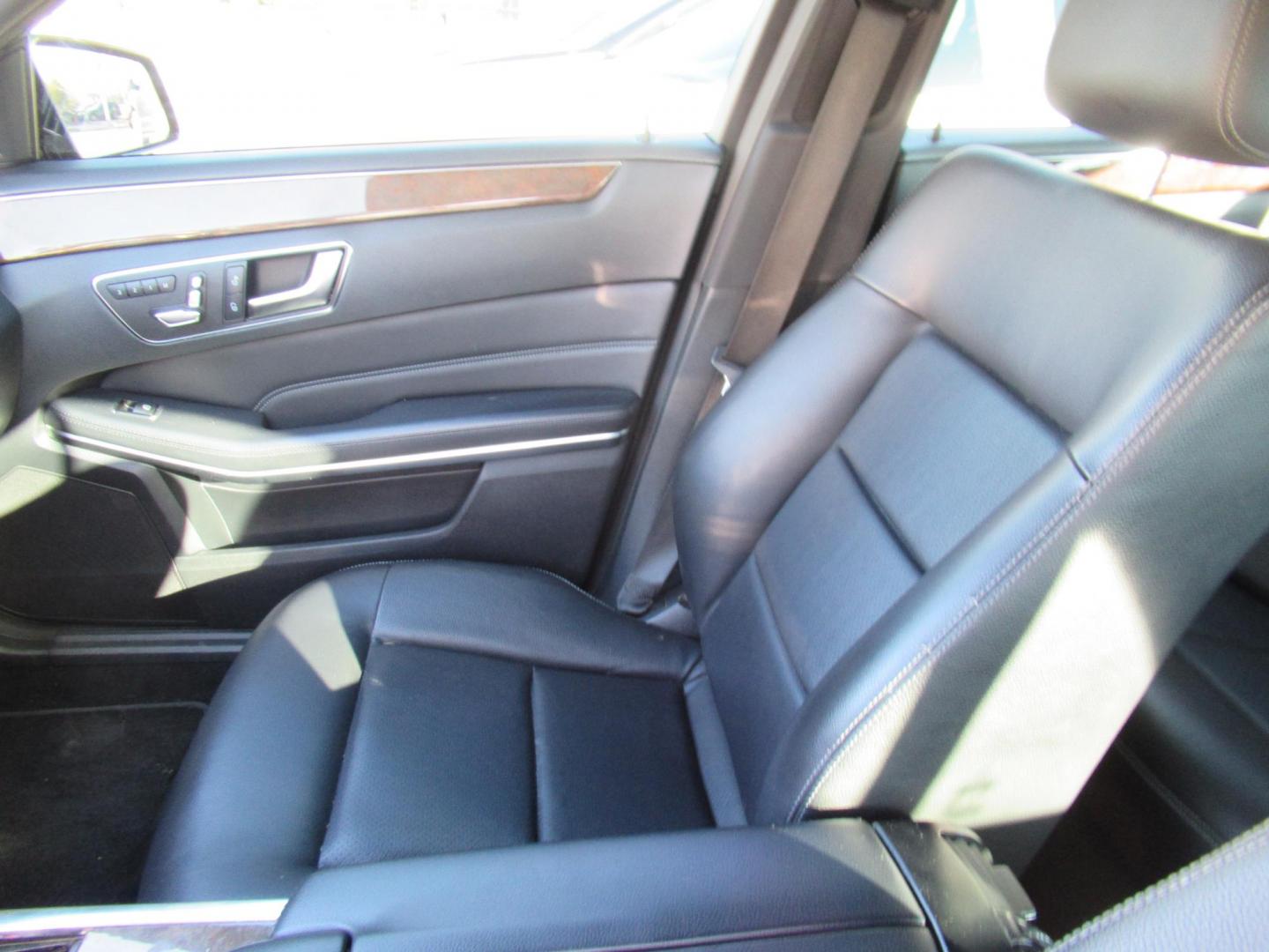 2014 Black /Black Mercedes-Benz E-Class E350 4MATIC Sedan (WDDHF8JB0EA) with an 3.5L V6 DOHC 24V engine, 7-Speed Automatic transmission, located at 1511 North Shepherd Dr., Houston, TX, 77008, (281) 657-1221, 29.798361, -95.412560 - 2014 MERCEDES-BENZ E-CLASS E 350 SPORT 4MATIC VIN: WDDHF8JB0EA815984 W D D H F 8 J B 0 E A 8 1 5 9 8 4 SEDAN 4 DR 3.5L V6 F DOHC 24V GASOLINE ALL WHEEL DRIVE - Photo#2