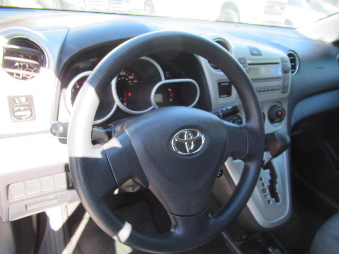 2009 Toyota Matrix Base AT (2T1KU40E99C) with an 1.8L L4 DOHC 16V engine, Automatic Overdrive transmission, located at 1511 North Shepherd Dr., Houston, TX, 77008, (281) 657-1221, 29.798361, -95.412560- Photo#3