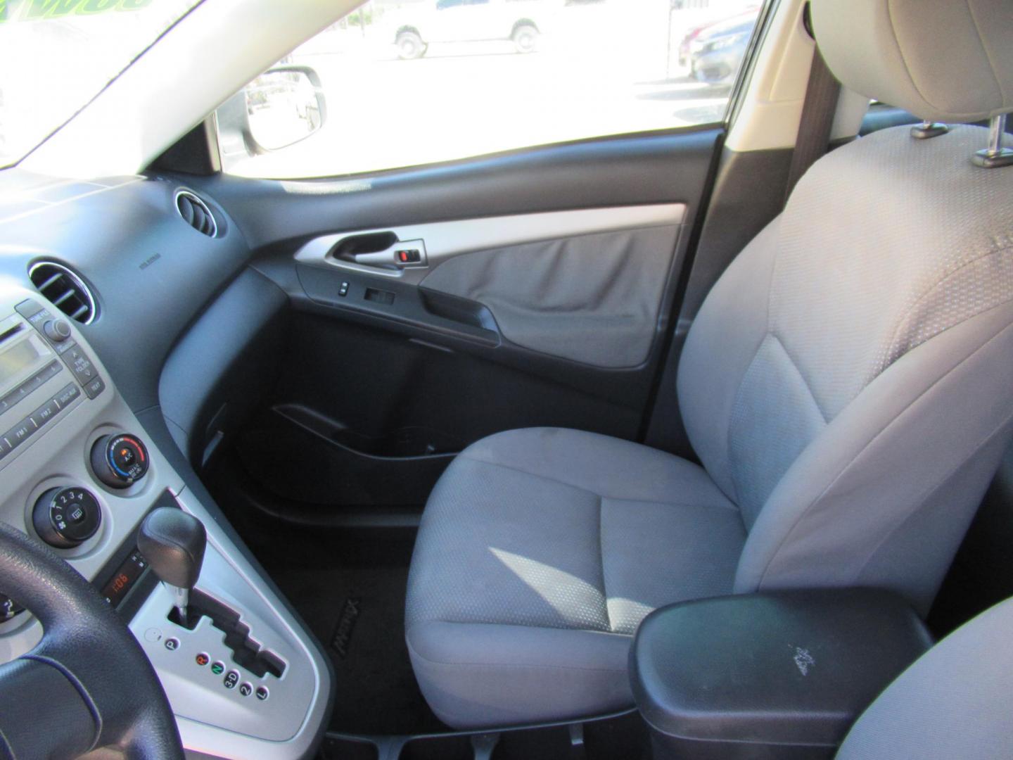 2009 Toyota Matrix Base AT (2T1KU40E99C) with an 1.8L L4 DOHC 16V engine, Automatic Overdrive transmission, located at 1511 North Shepherd Dr., Houston, TX, 77008, (281) 657-1221, 29.798361, -95.412560- Photo#1