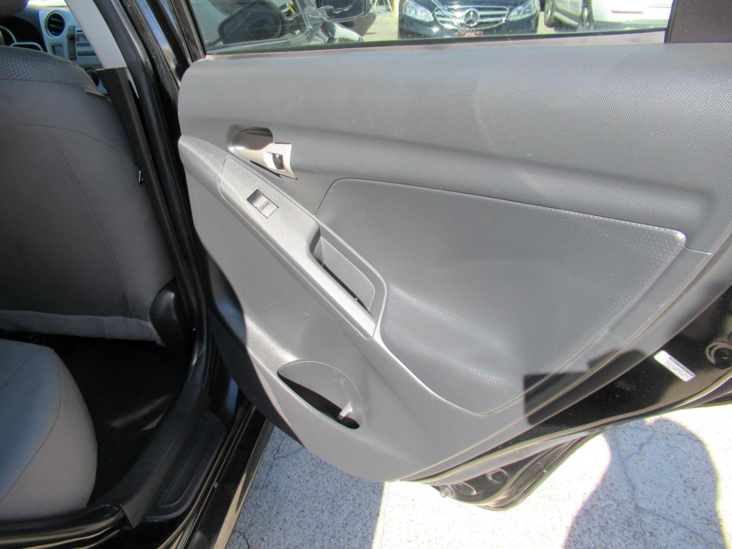 2009 Toyota Matrix Base AT (2T1KU40E99C) with an 1.8L L4 DOHC 16V engine, Automatic Overdrive transmission, located at 1511 North Shepherd Dr., Houston, TX, 77008, (281) 657-1221, 29.798361, -95.412560- Photo#12