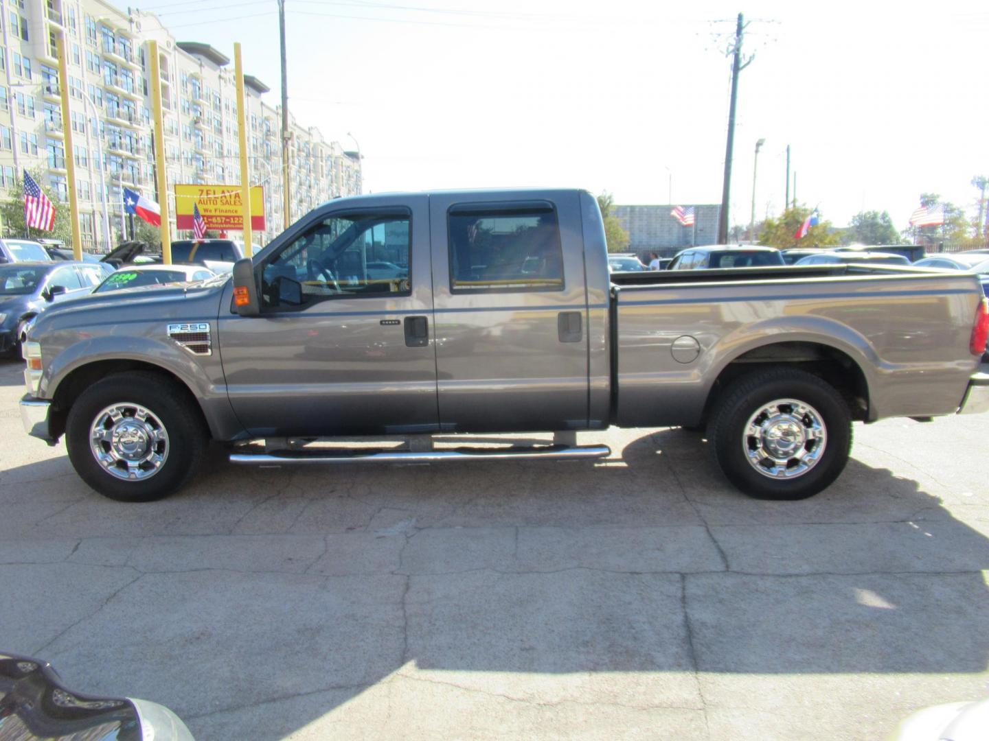 2010 Gray /Gray Ford F-250 SD Lariat Crew Cab 2WD (1FTSW2AR1AE) with an 6.4L V8 OHV 32V TURBO DIESEL engine, Automatic transmission, located at 1511 North Shepherd Dr., Houston, TX, 77008, (281) 657-1221, 29.798361, -95.412560 - 2010 FORD F-250 SUPER DUTY XLT VIN: 1FTSW2AR1AEA56887 1 F T S W 2 A R 1 A E A 5 6 8 8 7 CREW PICKUP 6.4L V8 F SOHC DIESEL REAR WHEEL DRIVE - Photo#0