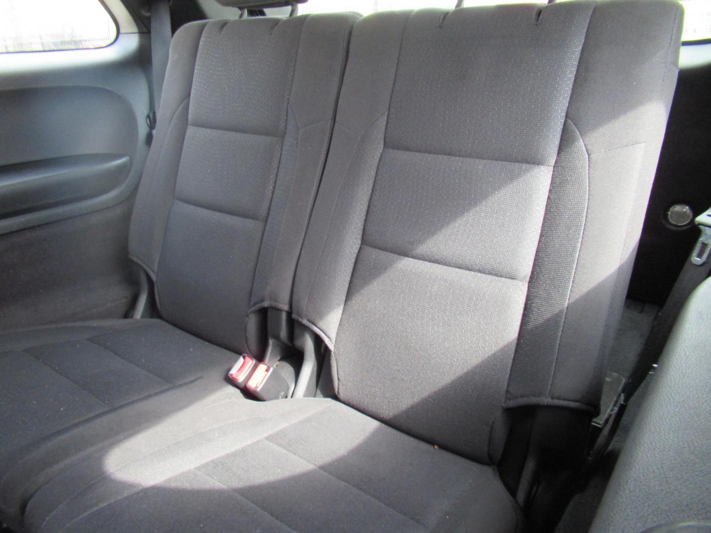 2013 White /Black Dodge Durango SXT RWD (1C4RDHAG3DC) with an 3.6L V6 DOHC 24V engine, Automatic transmission, located at 1511 North Shepherd Dr., Houston, TX, 77008, (281) 657-1221, 29.798361, -95.412560 - 2013 DODGE DURANGO SXT VIN: 1C4RDHAG3DC694368 1 C 4 R D H A G 3 D C 6 9 4 3 6 8 4 DOOR WAGON/SPORT UTILITY 3.6L V6 F DOHC 24V GASOLINE REAR WHEEL DRIVE - Photo#9