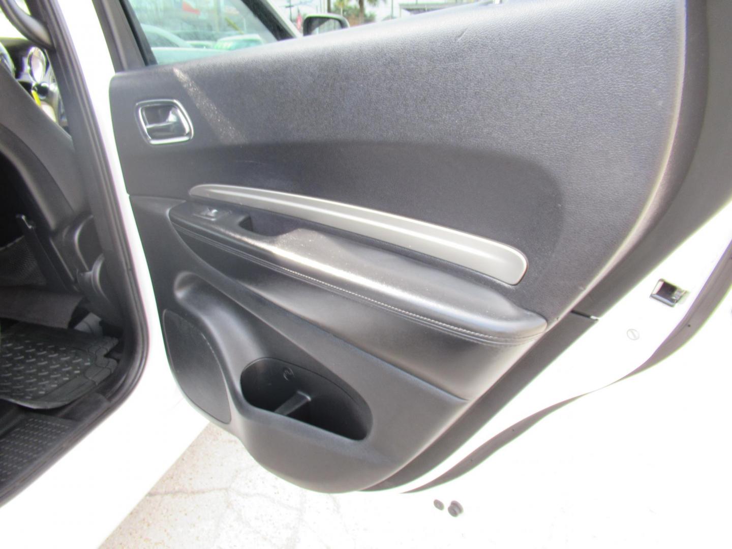 2013 White /Black Dodge Durango SXT RWD (1C4RDHAG3DC) with an 3.6L V6 DOHC 24V engine, Automatic transmission, located at 1511 North Shepherd Dr., Houston, TX, 77008, (281) 657-1221, 29.798361, -95.412560 - 2013 DODGE DURANGO SXT VIN: 1C4RDHAG3DC694368 1 C 4 R D H A G 3 D C 6 9 4 3 6 8 4 DOOR WAGON/SPORT UTILITY 3.6L V6 F DOHC 24V GASOLINE REAR WHEEL DRIVE - Photo#14