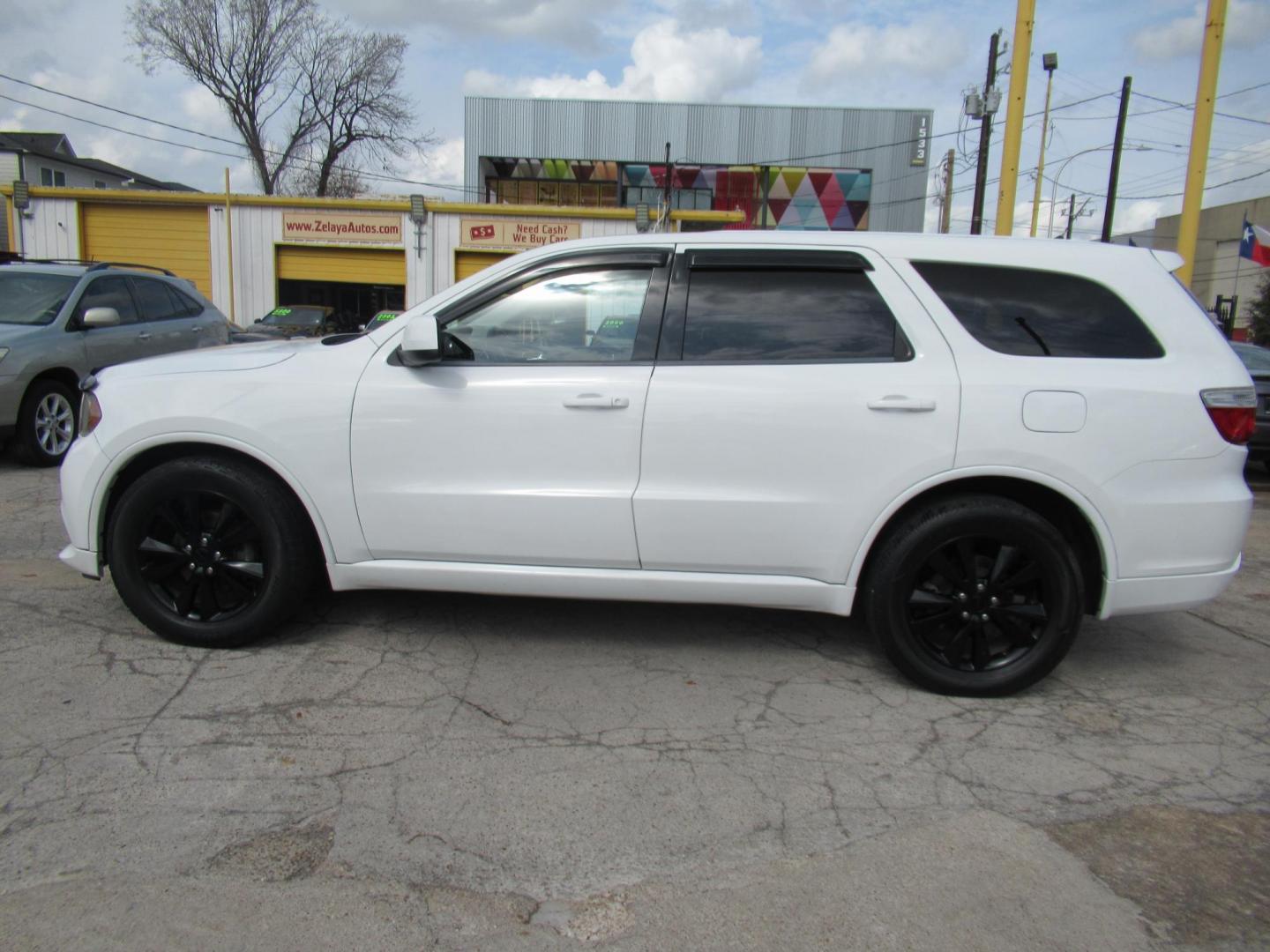 2013 White /Black Dodge Durango SXT RWD (1C4RDHAG3DC) with an 3.6L V6 DOHC 24V engine, Automatic transmission, located at 1511 North Shepherd Dr., Houston, TX, 77008, (281) 657-1221, 29.798361, -95.412560 - 2013 DODGE DURANGO SXT VIN: 1C4RDHAG3DC694368 1 C 4 R D H A G 3 D C 6 9 4 3 6 8 4 DOOR WAGON/SPORT UTILITY 3.6L V6 F DOHC 24V GASOLINE REAR WHEEL DRIVE - Photo#17