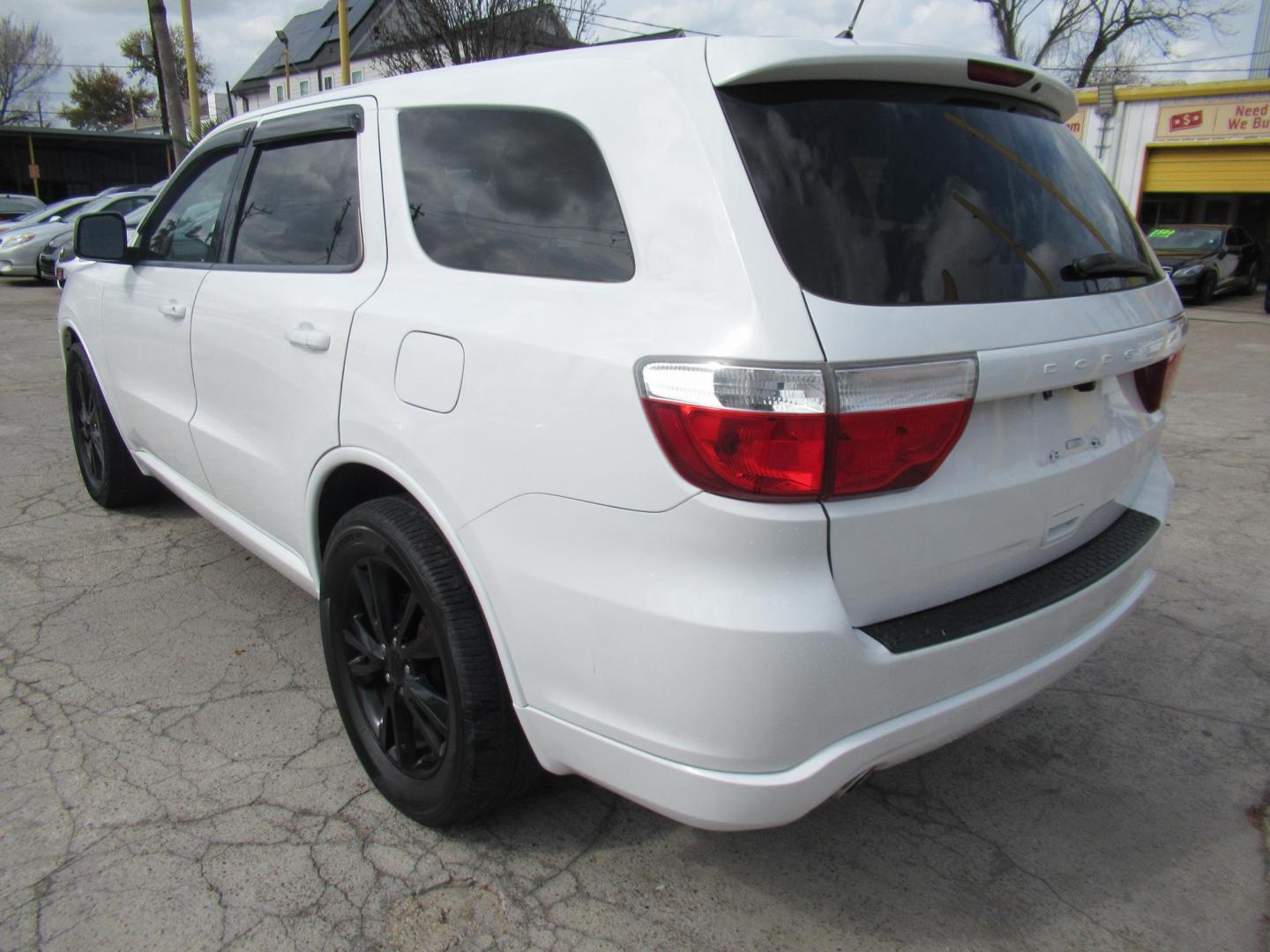 2013 White /Black Dodge Durango SXT RWD (1C4RDHAG3DC) with an 3.6L V6 DOHC 24V engine, Automatic transmission, located at 1511 North Shepherd Dr., Houston, TX, 77008, (281) 657-1221, 29.798361, -95.412560 - 2013 DODGE DURANGO SXT VIN: 1C4RDHAG3DC694368 1 C 4 R D H A G 3 D C 6 9 4 3 6 8 4 DOOR WAGON/SPORT UTILITY 3.6L V6 F DOHC 24V GASOLINE REAR WHEEL DRIVE - Photo#19