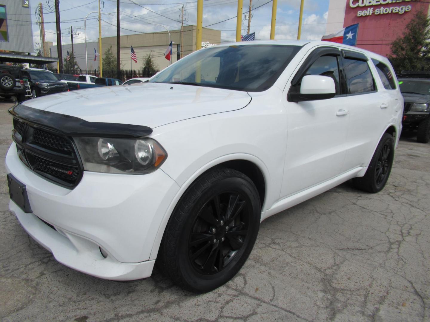 2013 White /Black Dodge Durango SXT RWD (1C4RDHAG3DC) with an 3.6L V6 DOHC 24V engine, Automatic transmission, located at 1511 North Shepherd Dr., Houston, TX, 77008, (281) 657-1221, 29.798361, -95.412560 - 2013 DODGE DURANGO SXT VIN: 1C4RDHAG3DC694368 1 C 4 R D H A G 3 D C 6 9 4 3 6 8 4 DOOR WAGON/SPORT UTILITY 3.6L V6 F DOHC 24V GASOLINE REAR WHEEL DRIVE - Photo#24