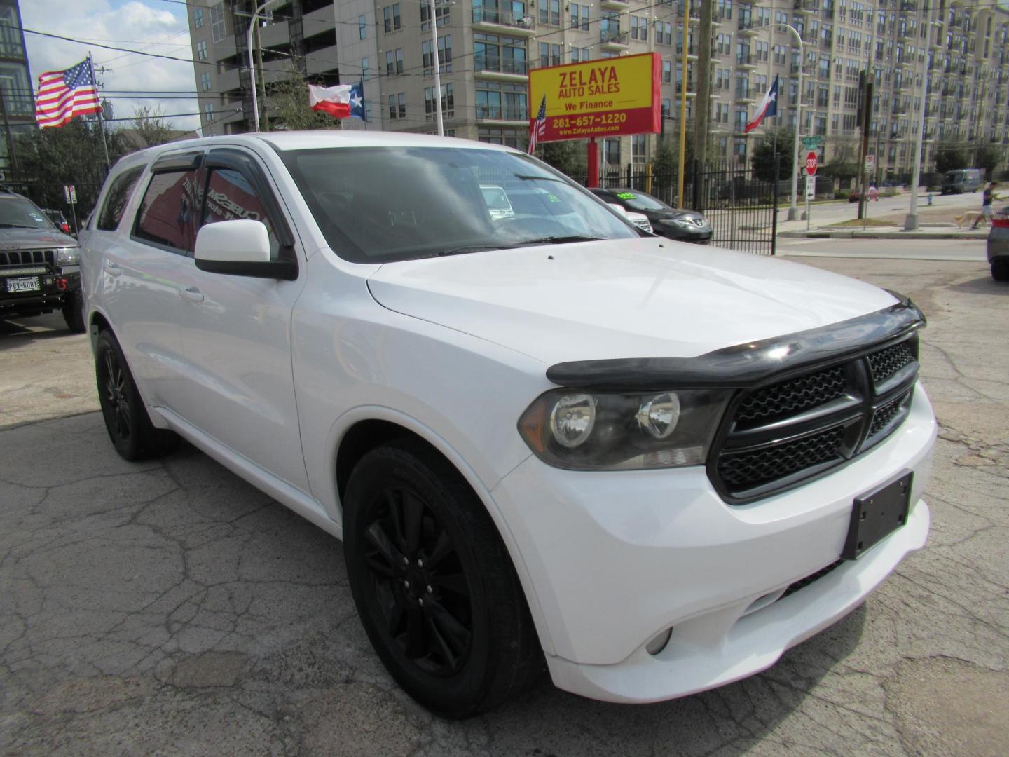 2013 White /Black Dodge Durango SXT RWD (1C4RDHAG3DC) with an 3.6L V6 DOHC 24V engine, Automatic transmission, located at 1511 North Shepherd Dr., Houston, TX, 77008, (281) 657-1221, 29.798361, -95.412560 - 2013 DODGE DURANGO SXT VIN: 1C4RDHAG3DC694368 1 C 4 R D H A G 3 D C 6 9 4 3 6 8 4 DOOR WAGON/SPORT UTILITY 3.6L V6 F DOHC 24V GASOLINE REAR WHEEL DRIVE - Photo#22