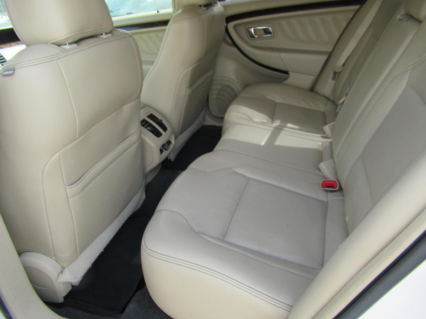 2013 White /Tan Ford Taurus Limited FWD (1FAHP2F87DG) with an 3.5L V6 DOHC 24V engine, 6-Speed Automatic transmission, located at 1511 North Shepherd Dr., Houston, TX, 77008, (281) 657-1221, 29.798361, -95.412560 - 2013 FORD TAURUS LIMITED VIN: 1FAHP2F87DG147989 1 F A H P 2 F 8 7 D G 1 4 7 9 8 9 SEDAN 4 DR 3.5L V6 F DOHC 24V GASOLINE FRONT WHEEL DRIVE- Photo#6