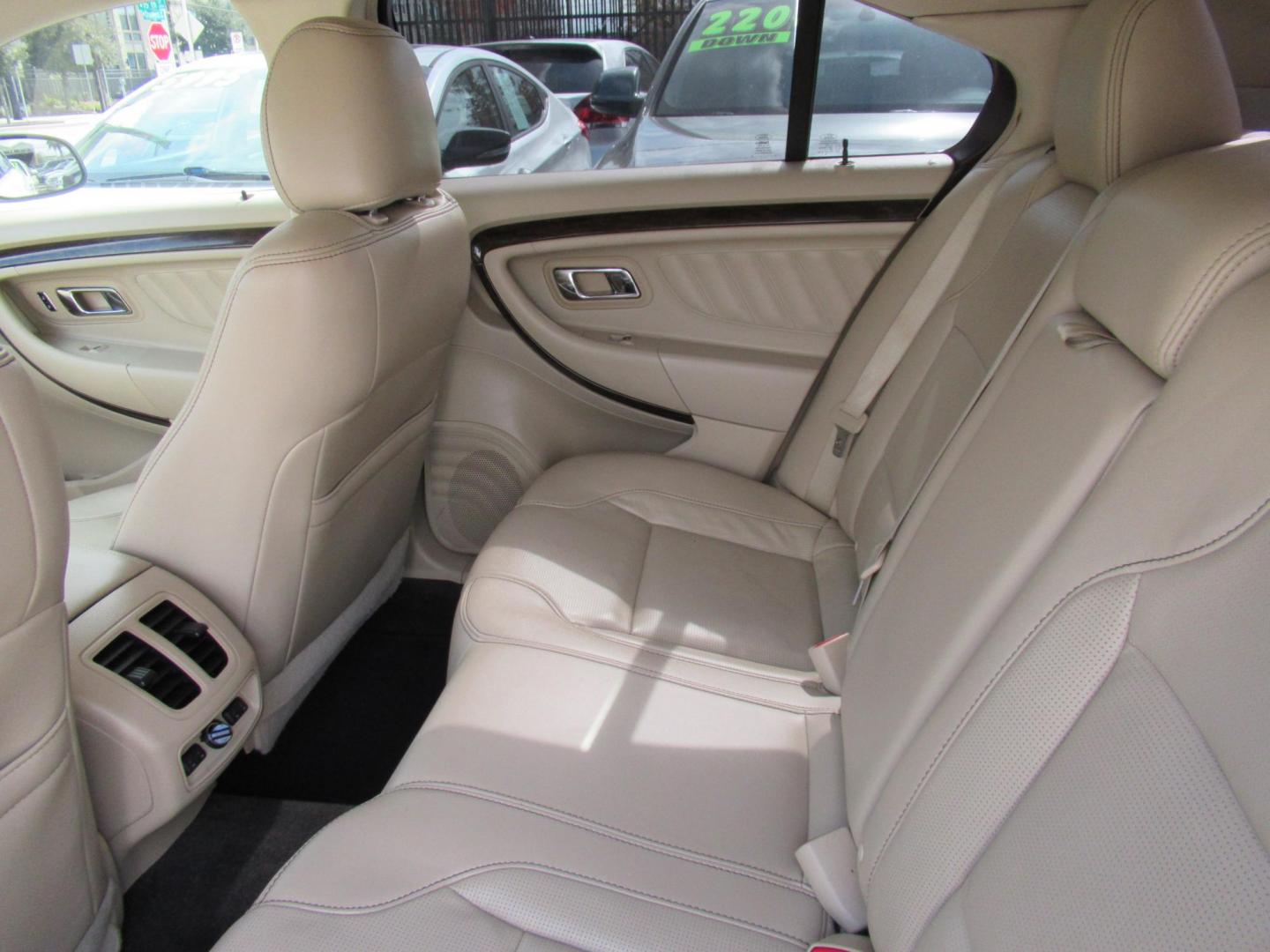 2013 White /Tan Ford Taurus Limited FWD (1FAHP2F87DG) with an 3.5L V6 DOHC 24V engine, 6-Speed Automatic transmission, located at 1511 North Shepherd Dr., Houston, TX, 77008, (281) 657-1221, 29.798361, -95.412560 - 2013 FORD TAURUS LIMITED VIN: 1FAHP2F87DG147989 1 F A H P 2 F 8 7 D G 1 4 7 9 8 9 SEDAN 4 DR 3.5L V6 F DOHC 24V GASOLINE FRONT WHEEL DRIVE- Photo#7