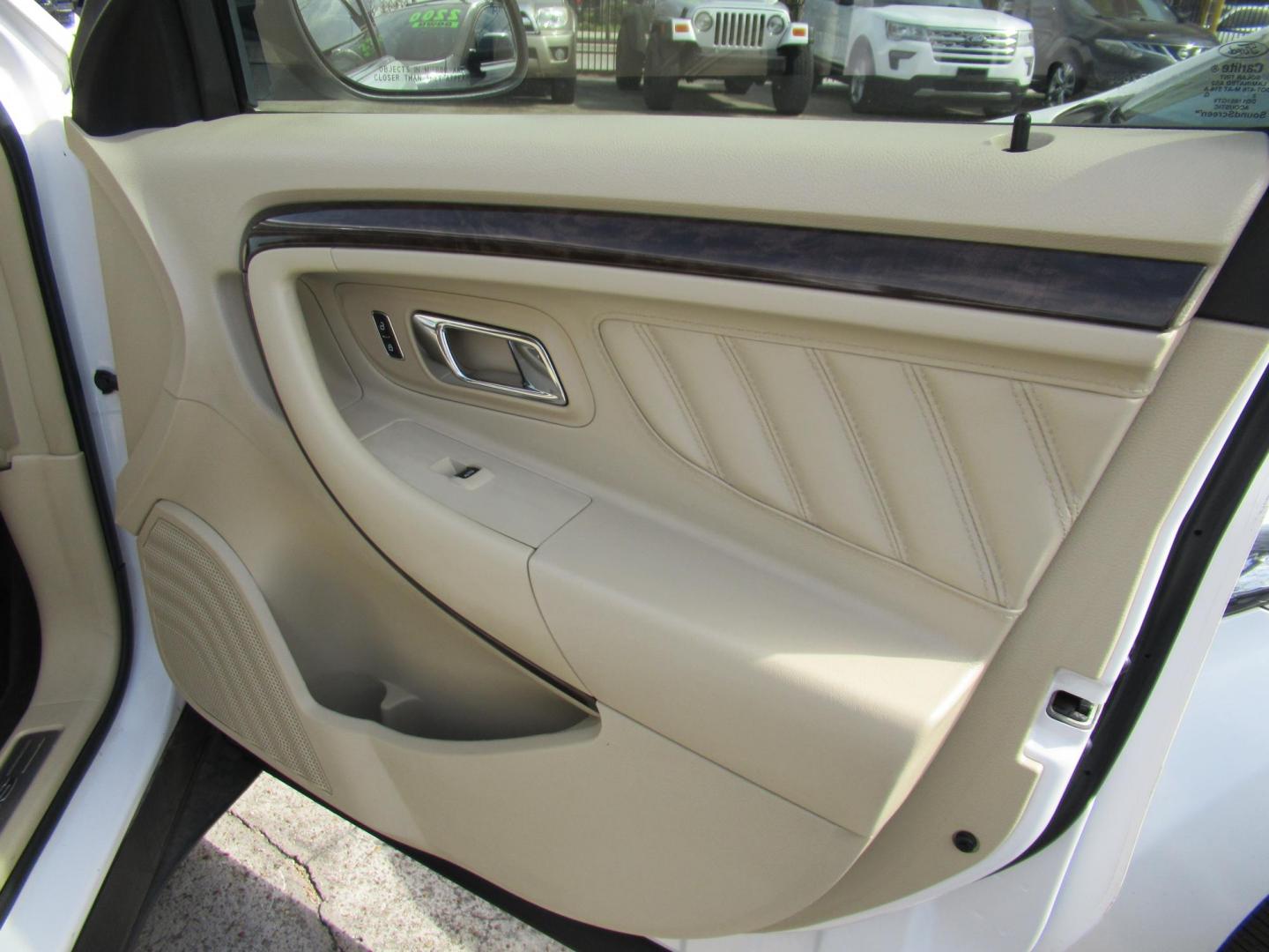 2013 White /Tan Ford Taurus Limited FWD (1FAHP2F87DG) with an 3.5L V6 DOHC 24V engine, 6-Speed Automatic transmission, located at 1511 North Shepherd Dr., Houston, TX, 77008, (281) 657-1221, 29.798361, -95.412560 - 2013 FORD TAURUS LIMITED VIN: 1FAHP2F87DG147989 1 F A H P 2 F 8 7 D G 1 4 7 9 8 9 SEDAN 4 DR 3.5L V6 F DOHC 24V GASOLINE FRONT WHEEL DRIVE- Photo#9