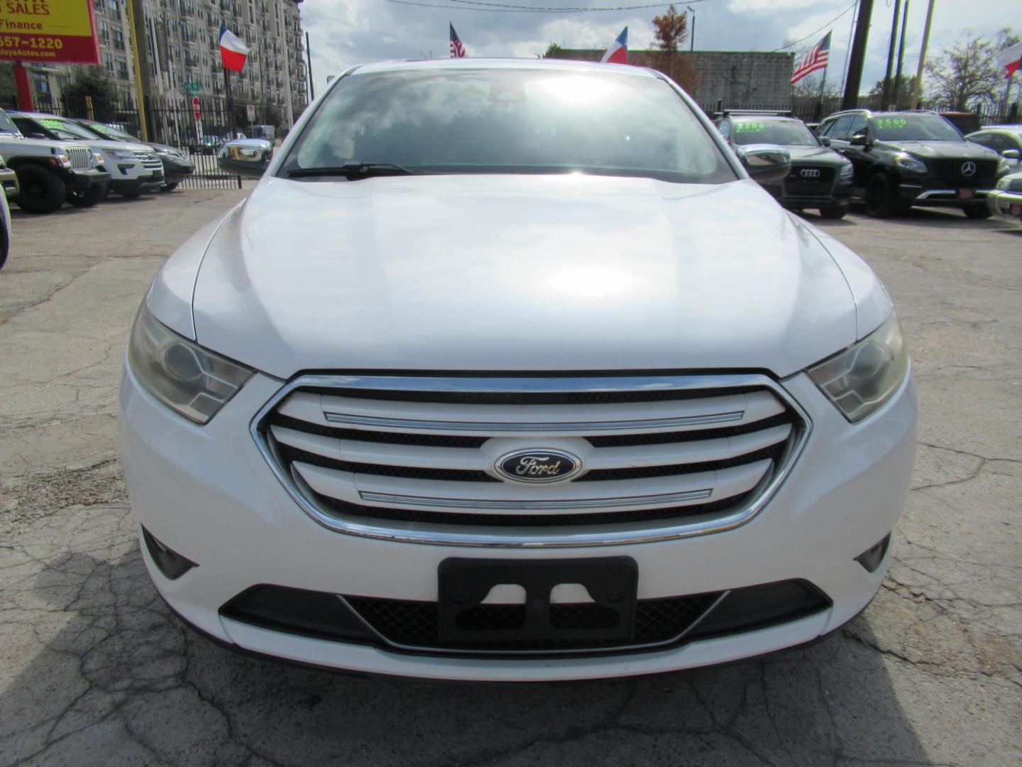 2013 White /Tan Ford Taurus Limited FWD (1FAHP2F87DG) with an 3.5L V6 DOHC 24V engine, 6-Speed Automatic transmission, located at 1511 North Shepherd Dr., Houston, TX, 77008, (281) 657-1221, 29.798361, -95.412560 - 2013 FORD TAURUS LIMITED VIN: 1FAHP2F87DG147989 1 F A H P 2 F 8 7 D G 1 4 7 9 8 9 SEDAN 4 DR 3.5L V6 F DOHC 24V GASOLINE FRONT WHEEL DRIVE- Photo#14