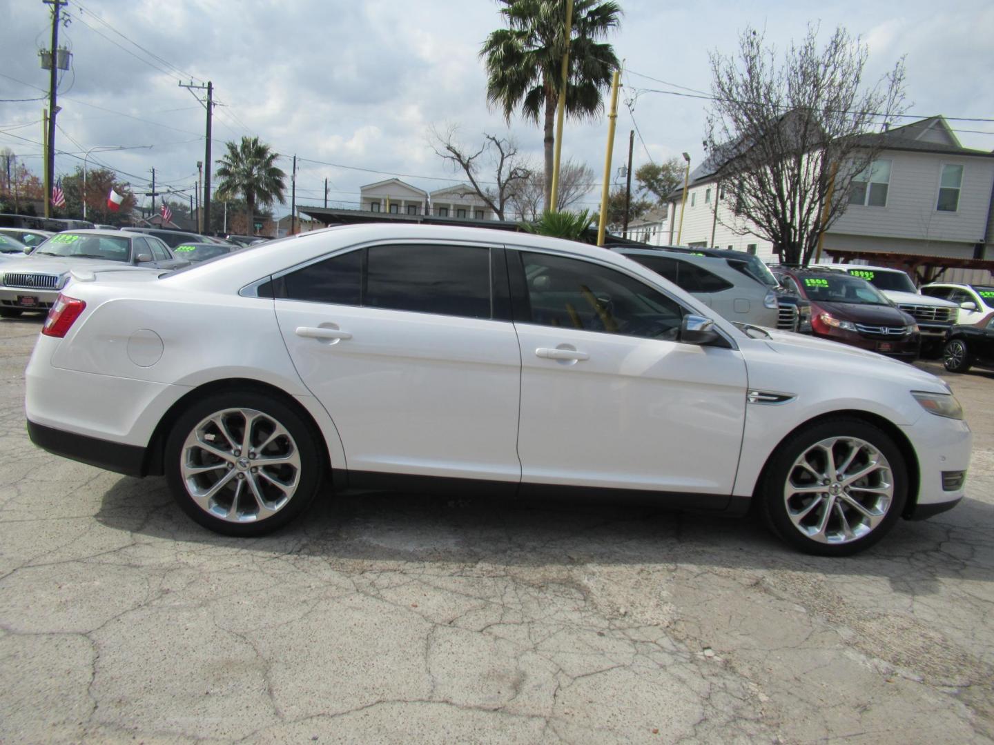 2013 White /Tan Ford Taurus Limited FWD (1FAHP2F87DG) with an 3.5L V6 DOHC 24V engine, 6-Speed Automatic transmission, located at 1511 North Shepherd Dr., Houston, TX, 77008, (281) 657-1221, 29.798361, -95.412560 - 2013 FORD TAURUS LIMITED VIN: 1FAHP2F87DG147989 1 F A H P 2 F 8 7 D G 1 4 7 9 8 9 SEDAN 4 DR 3.5L V6 F DOHC 24V GASOLINE FRONT WHEEL DRIVE- Photo#17