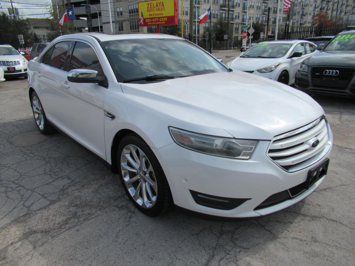 2013 White /Tan Ford Taurus Limited FWD (1FAHP2F87DG) with an 3.5L V6 DOHC 24V engine, 6-Speed Automatic transmission, located at 1511 North Shepherd Dr., Houston, TX, 77008, (281) 657-1221, 29.798361, -95.412560 - 2013 FORD TAURUS LIMITED VIN: 1FAHP2F87DG147989 1 F A H P 2 F 8 7 D G 1 4 7 9 8 9 SEDAN 4 DR 3.5L V6 F DOHC 24V GASOLINE FRONT WHEEL DRIVE- Photo#21
