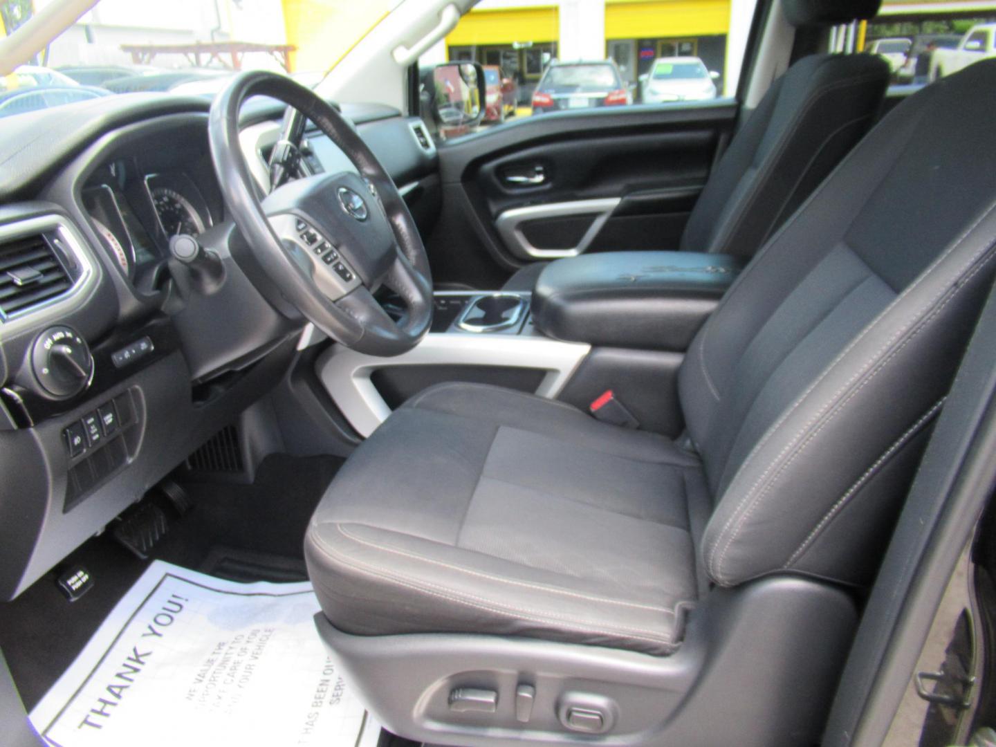2017 Black /Black Nissan Titan S Crew Cab 2WD (1N6AA1E60HN) with an 5.6L V8 DOHC 32V engine, 6A transmission, located at 1511 North Shepherd Dr., Houston, TX, 77008, (281) 657-1221, 29.798361, -95.412560 - 2017 NISSAN TITAN SV VIN: 1N6AA1E60HN564070 1 N 6 A A 1 E 6 0 H N 5 6 4 0 7 0 CREW PICKUP 5.6L V8 F DOHC 32V GASOLINE REAR WHEEL DRIVE - Photo#9
