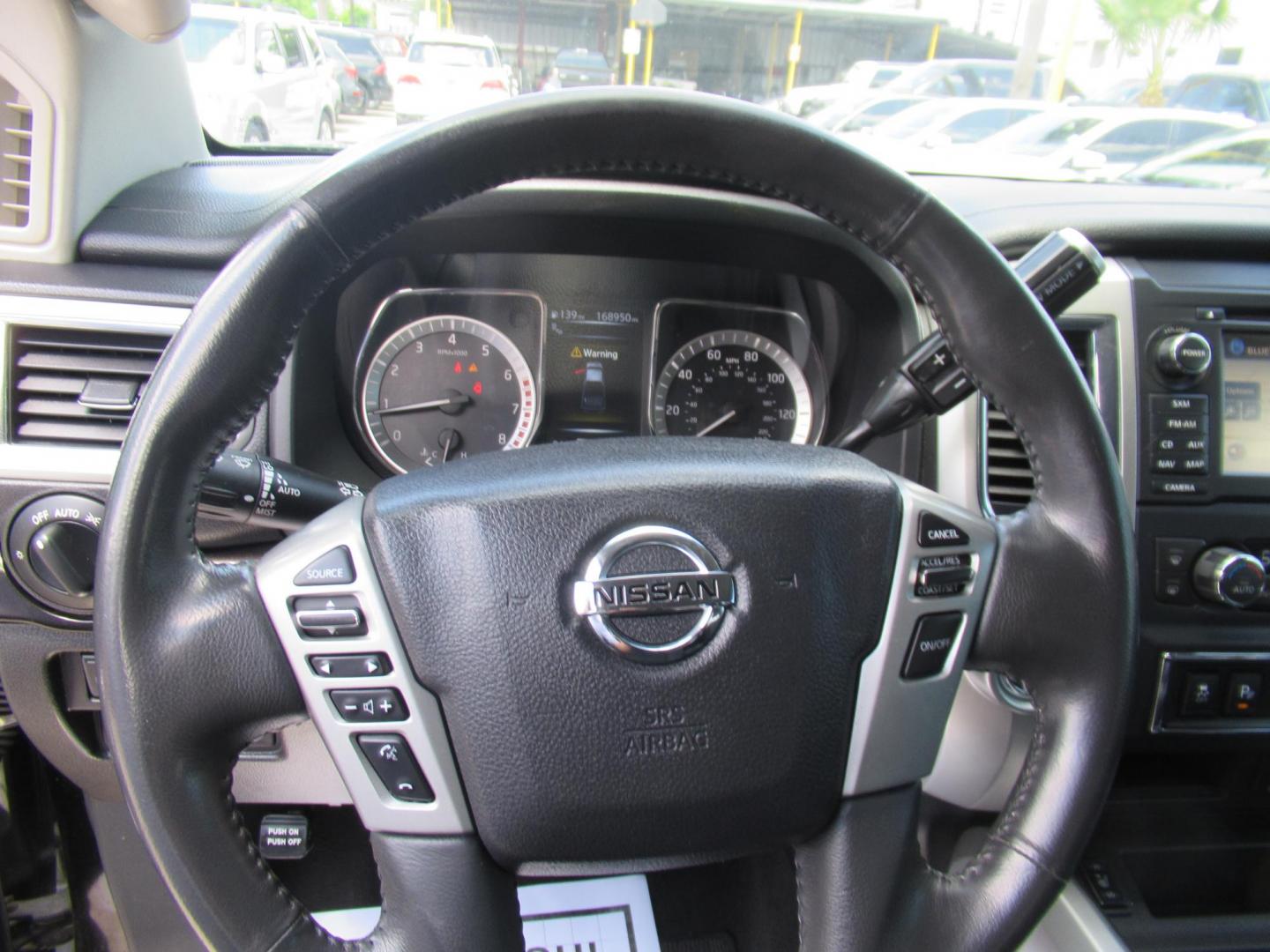 2017 Black /Black Nissan Titan S Crew Cab 2WD (1N6AA1E60HN) with an 5.6L V8 DOHC 32V engine, 6A transmission, located at 1511 North Shepherd Dr., Houston, TX, 77008, (281) 657-1221, 29.798361, -95.412560 - 2017 NISSAN TITAN SV VIN: 1N6AA1E60HN564070 1 N 6 A A 1 E 6 0 H N 5 6 4 0 7 0 CREW PICKUP 5.6L V8 F DOHC 32V GASOLINE REAR WHEEL DRIVE - Photo#10