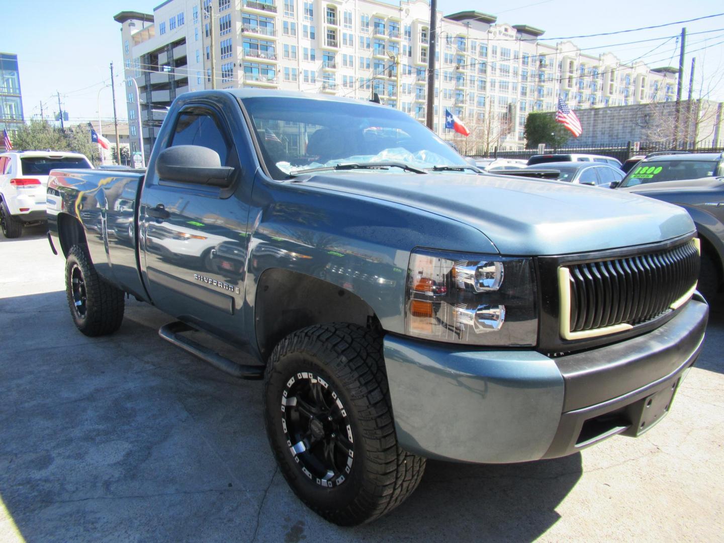 2007 Green /Black Chevrolet Silverado 1500 LT1 4WD (1GCEK14007Z) with an 5.3L V8 OHV 16V FFV engine, 4-Speed Automatic Overdrive transmission, located at 1511 North Shepherd Dr., Houston, TX, 77008, (281) 657-1221, 29.798361, -95.412560 - 2007 CHEVROLET SILVERADO 1500 WORK TRUCK VIN: 1GCEK14007Z606940 1 G C E K 1 4 0 0 7 Z 6 0 6 9 4 0 PICKUP 5.3L V8 F FLEX FUEL REAR WHEEL DRIVE W/ 4X4 - Photo#3