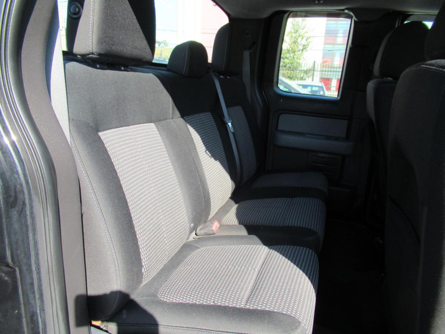 2014 Black /Gray Ford F-150 XLT SuperCab 8-ft. Bed 2WD (1FTEX1CM4EF) with an 3.7L V6 DOHC 24V engine, Automatic transmission, located at 1511 North Shepherd Dr., Houston, TX, 77008, (281) 657-1221, 29.798361, -95.412560 - 2014 FORD F-150 STX VIN: 1FTEX1CM4EFA27907 1 F T E X 1 C M 4 E F A 2 7 9 0 7 4 DOOR EXTENDED CAB PICKUP 3.7L V6 F DOHC 24V FLEX FUEL REAR WHEEL DRIVE - Photo#1