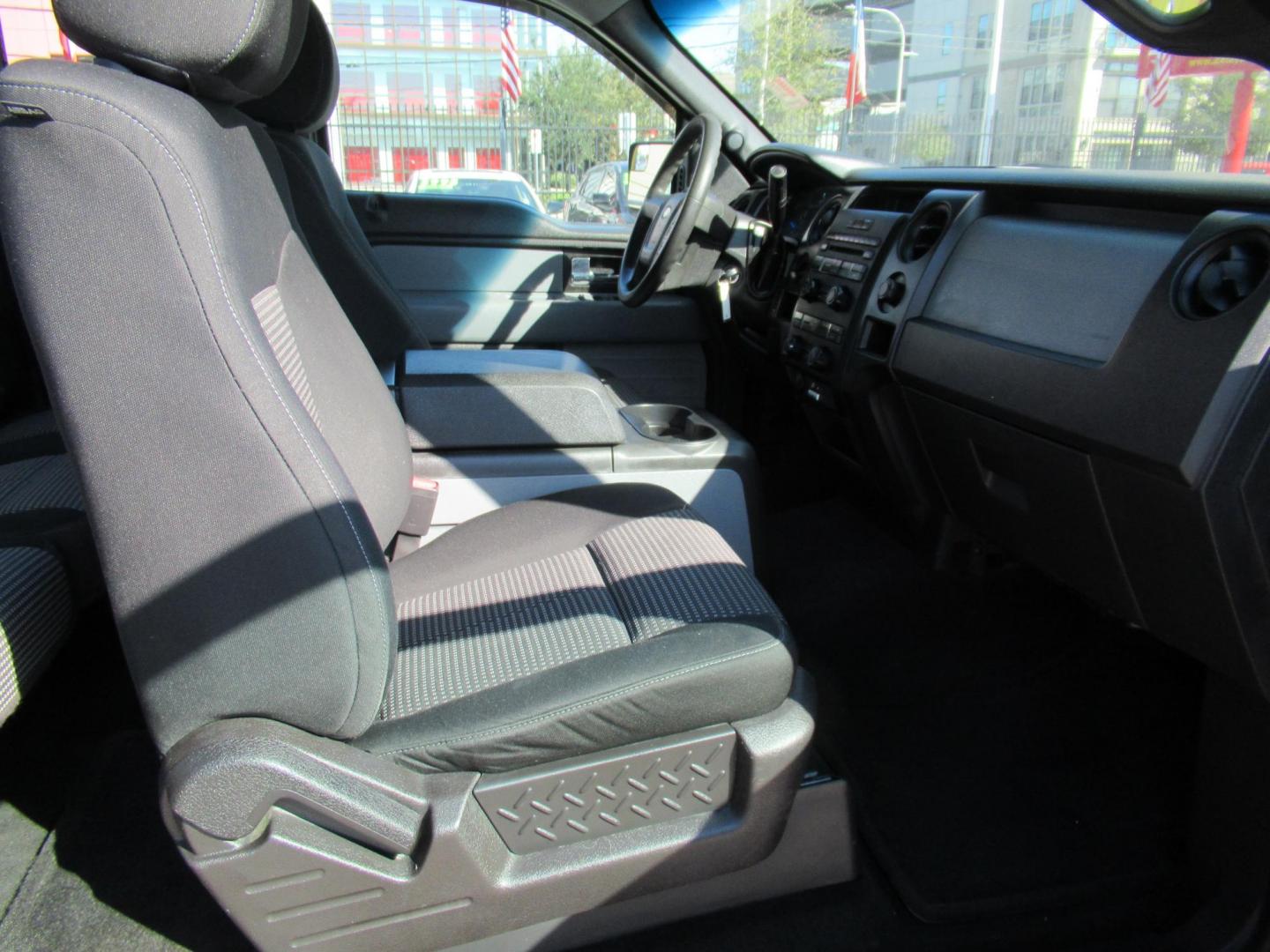 2014 Black /Gray Ford F-150 XLT SuperCab 8-ft. Bed 2WD (1FTEX1CM4EF) with an 3.7L V6 DOHC 24V engine, Automatic transmission, located at 1511 North Shepherd Dr., Houston, TX, 77008, (281) 657-1221, 29.798361, -95.412560 - 2014 FORD F-150 STX VIN: 1FTEX1CM4EFA27907 1 F T E X 1 C M 4 E F A 2 7 9 0 7 4 DOOR EXTENDED CAB PICKUP 3.7L V6 F DOHC 24V FLEX FUEL REAR WHEEL DRIVE - Photo#2
