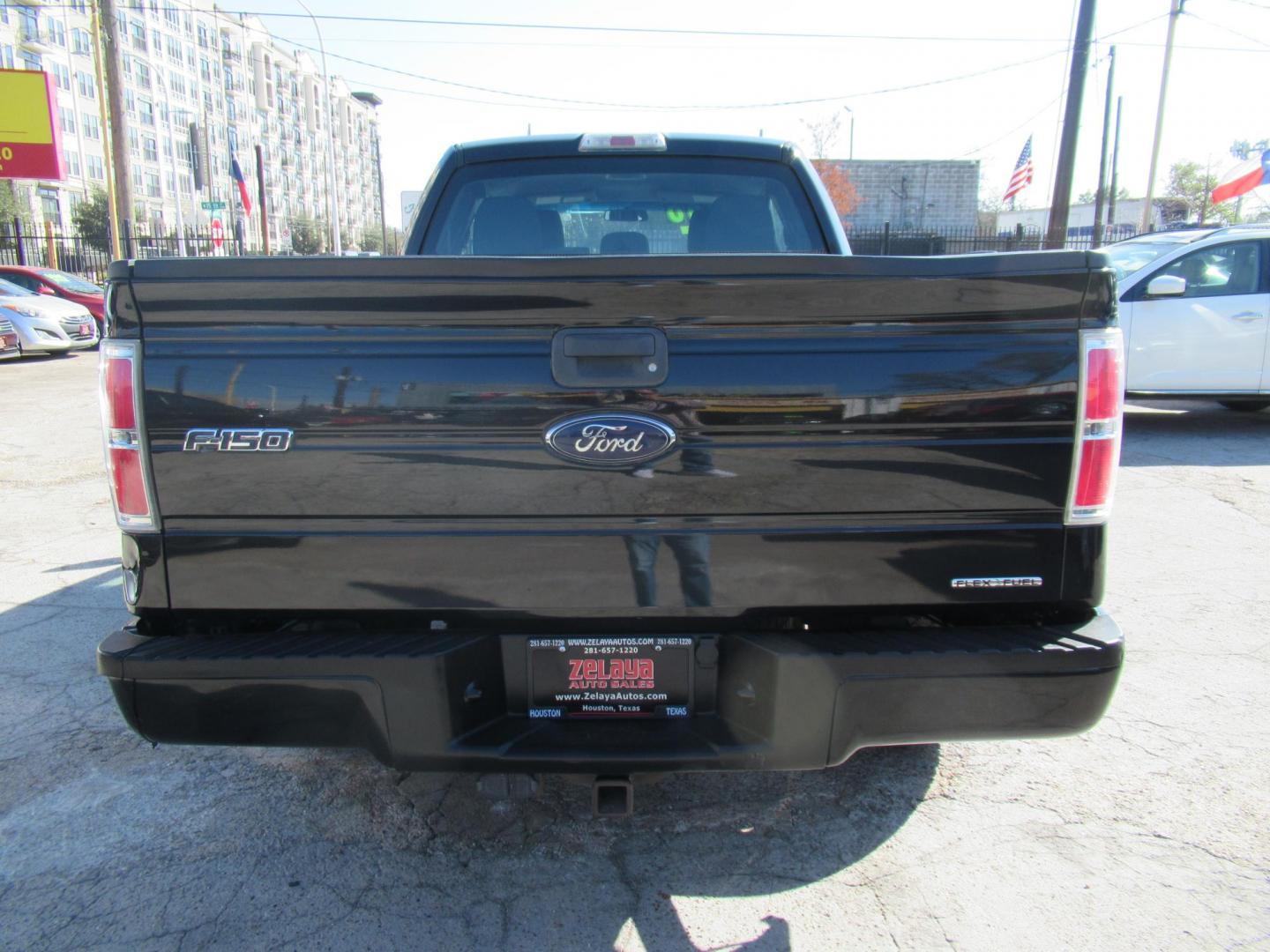 2014 Black /Gray Ford F-150 XLT SuperCab 8-ft. Bed 2WD (1FTEX1CM4EF) with an 3.7L V6 DOHC 24V engine, Automatic transmission, located at 1511 North Shepherd Dr., Houston, TX, 77008, (281) 657-1221, 29.798361, -95.412560 - 2014 FORD F-150 STX VIN: 1FTEX1CM4EFA27907 1 F T E X 1 C M 4 E F A 2 7 9 0 7 4 DOOR EXTENDED CAB PICKUP 3.7L V6 F DOHC 24V FLEX FUEL REAR WHEEL DRIVE - Photo#7