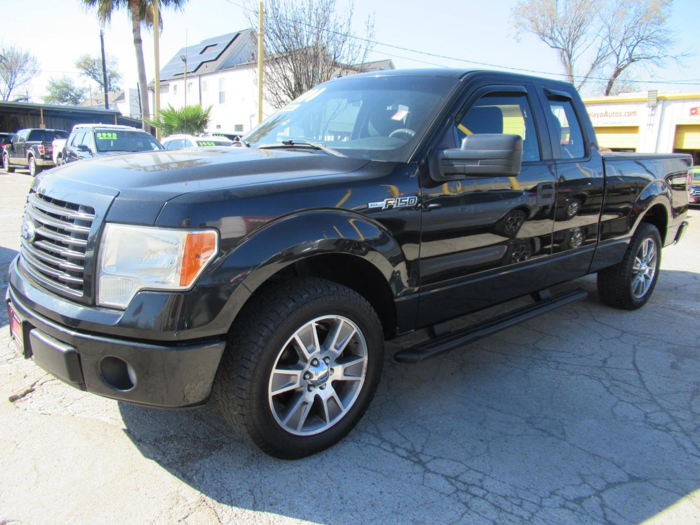 2014 Black /Gray Ford F-150 XLT SuperCab 8-ft. Bed 2WD (1FTEX1CM4EF) with an 3.7L V6 DOHC 24V engine, Automatic transmission, located at 1511 North Shepherd Dr., Houston, TX, 77008, (281) 657-1221, 29.798361, -95.412560 - 2014 FORD F-150 STX VIN: 1FTEX1CM4EFA27907 1 F T E X 1 C M 4 E F A 2 7 9 0 7 4 DOOR EXTENDED CAB PICKUP 3.7L V6 F DOHC 24V FLEX FUEL REAR WHEEL DRIVE - Photo#10