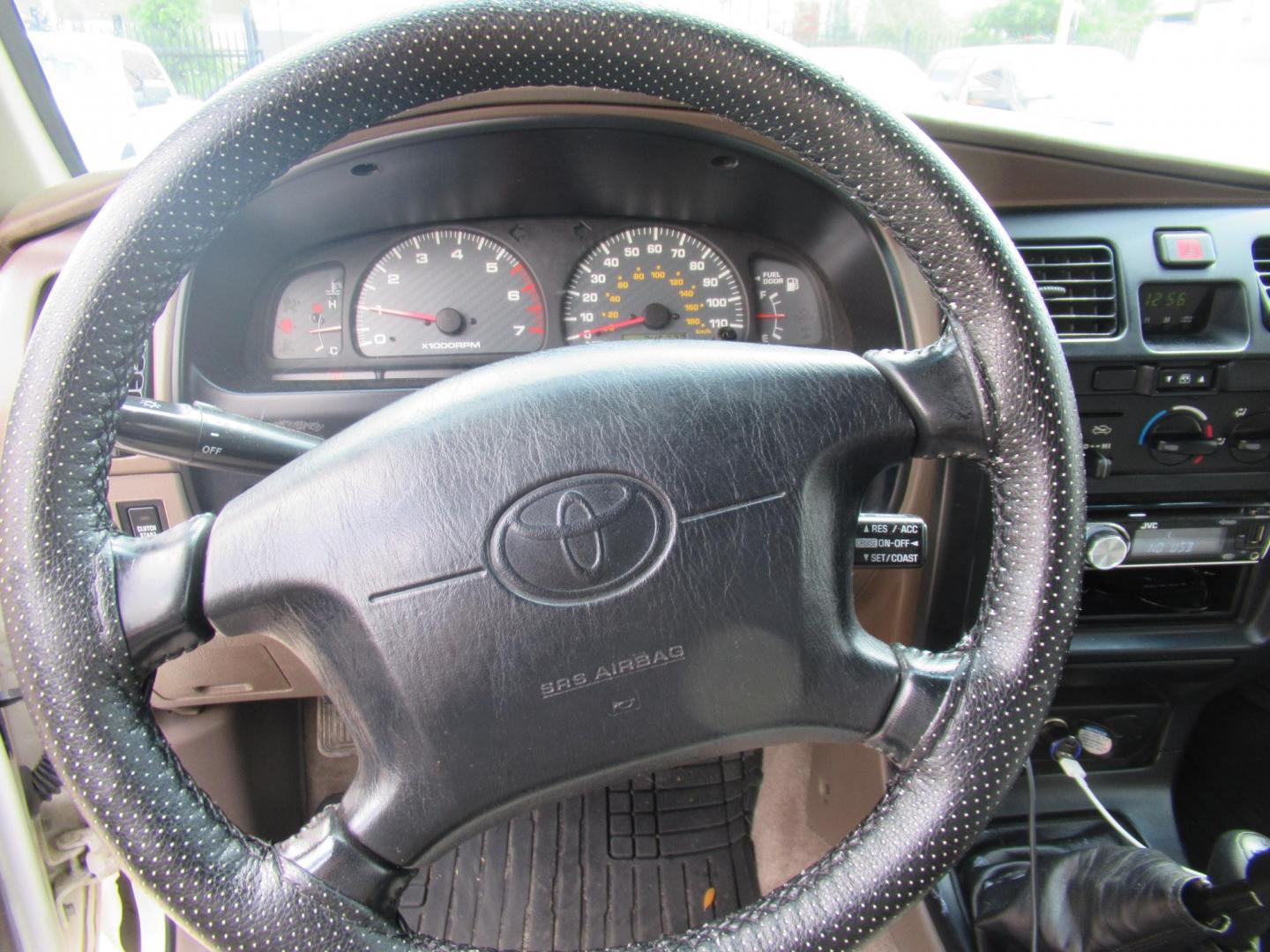 1999 White /Tan Toyota 4Runner SR5 4WD (JT3HN86R2X0) with an 3.4L V6 DOHC 24V engine, Manual transmission, located at 1511 North Shepherd Dr., Houston, TX, 77008, (281) 657-1221, 29.798361, -95.412560 - 1999 TOYOTA 4RUNNER SR5 VIN: JT3HN86R2X0209442 J T 3 H N 8 6 R 2 X 0 2 0 9 4 4 2 4 DOOR WAGON/SPORT UTILITY 3.4L V6 F DOHC 24V GASOLINE REAR WHEEL DRIVE W/ 4X4 - Photo#8