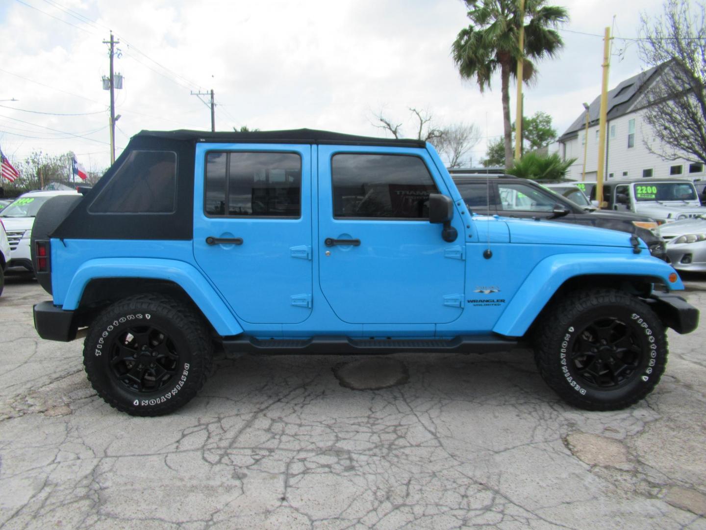 2017 BLUE /Black Jeep Wrangler Unlimited Sahara 4WD (1C4BJWEG1HL) with an 3.6L V6 DOHC 24V FFV engine, Automatic transmission, located at 1511 North Shepherd Dr., Houston, TX, 77008, (281) 657-1221, 29.798361, -95.412560 - 2017 JEEP WRANGLER UNLIMITED SAHARA VIN: 1C4BJWEG1HL571389 1 C 4 B J W E G 1 H L 5 7 1 3 8 9 4 DOOR WAGON/SPORT UTILITY 3.6L V6 F DOHC 24V GASOLINE REAR WHEEL DRIVE W/ 4X4 - Photo#0
