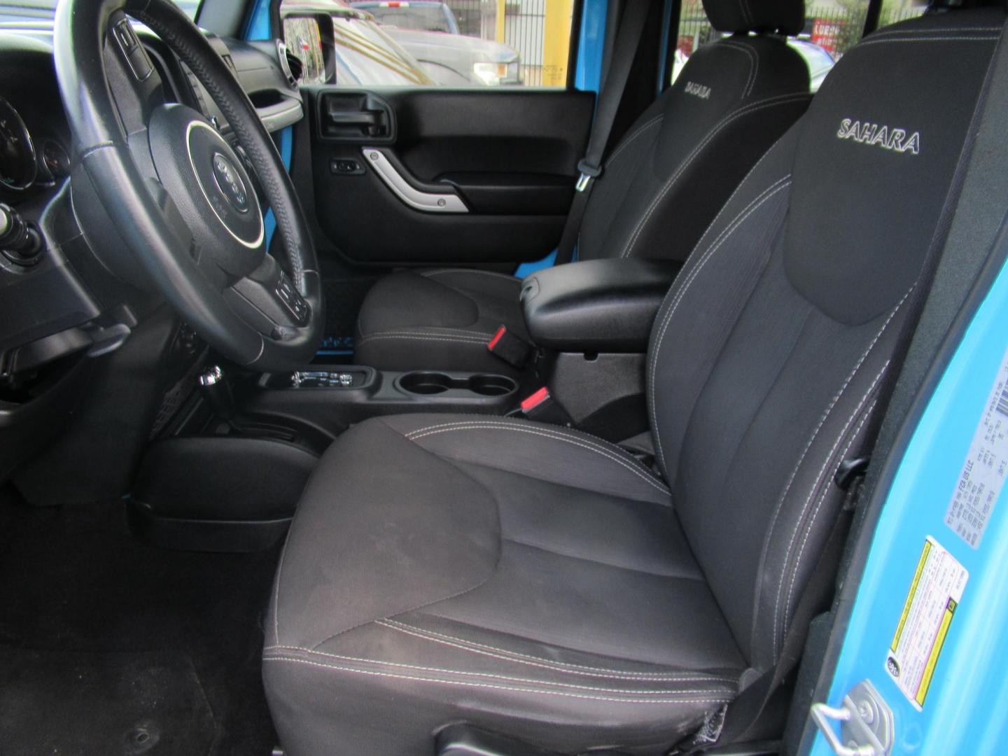 2017 BLUE /Black Jeep Wrangler Unlimited Sahara 4WD (1C4BJWEG1HL) with an 3.6L V6 DOHC 24V FFV engine, Automatic transmission, located at 1511 North Shepherd Dr., Houston, TX, 77008, (281) 657-1221, 29.798361, -95.412560 - 2017 JEEP WRANGLER UNLIMITED SAHARA VIN: 1C4BJWEG1HL571389 1 C 4 B J W E G 1 H L 5 7 1 3 8 9 4 DOOR WAGON/SPORT UTILITY 3.6L V6 F DOHC 24V GASOLINE REAR WHEEL DRIVE W/ 4X4 - Photo#1