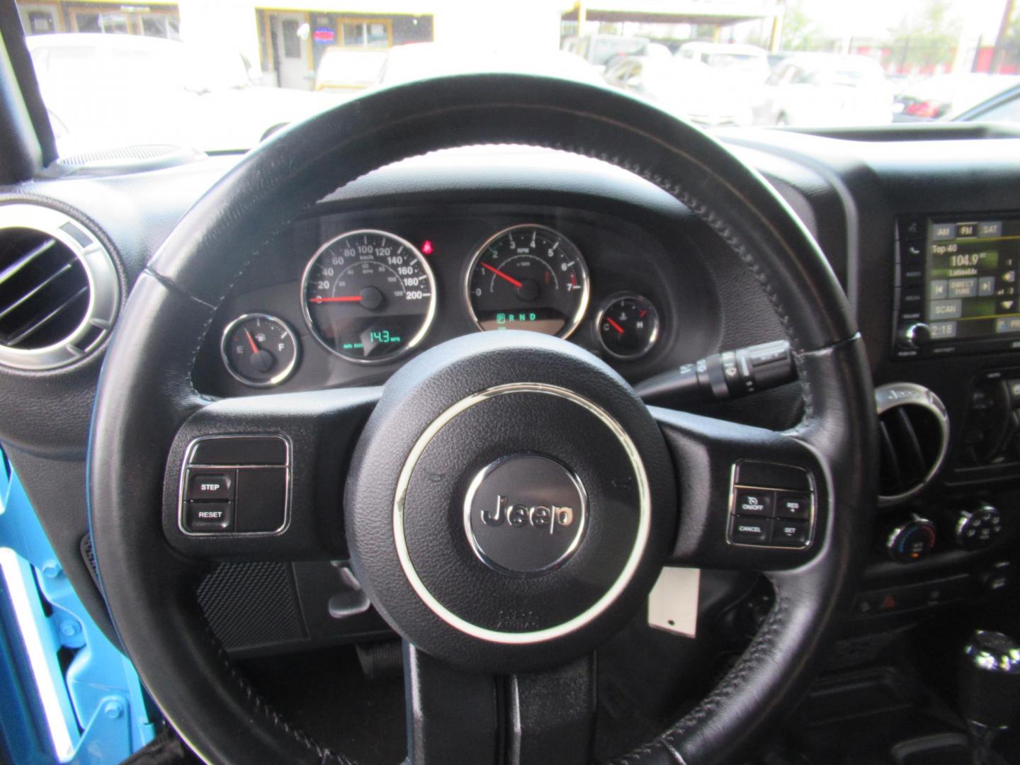 2017 BLUE /Black Jeep Wrangler Unlimited Sahara 4WD (1C4BJWEG1HL) with an 3.6L V6 DOHC 24V FFV engine, Automatic transmission, located at 1511 North Shepherd Dr., Houston, TX, 77008, (281) 657-1221, 29.798361, -95.412560 - 2017 JEEP WRANGLER UNLIMITED SAHARA VIN: 1C4BJWEG1HL571389 1 C 4 B J W E G 1 H L 5 7 1 3 8 9 4 DOOR WAGON/SPORT UTILITY 3.6L V6 F DOHC 24V GASOLINE REAR WHEEL DRIVE W/ 4X4 - Photo#3