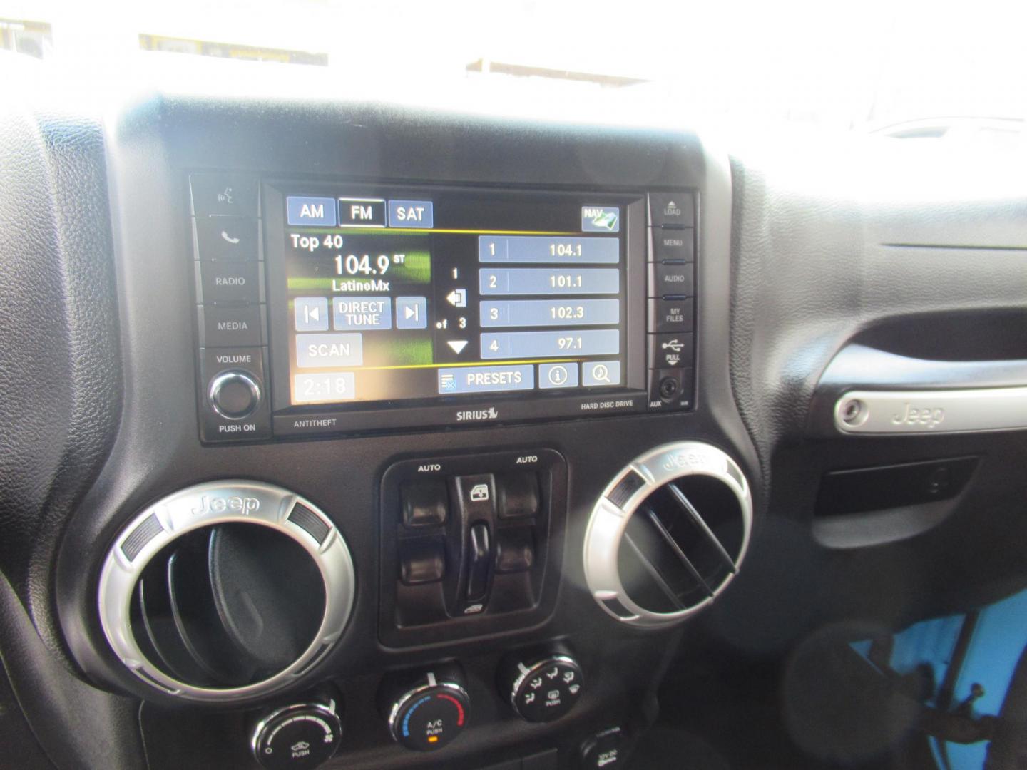 2017 BLUE /Black Jeep Wrangler Unlimited Sahara 4WD (1C4BJWEG1HL) with an 3.6L V6 DOHC 24V FFV engine, Automatic transmission, located at 1511 North Shepherd Dr., Houston, TX, 77008, (281) 657-1221, 29.798361, -95.412560 - 2017 JEEP WRANGLER UNLIMITED SAHARA VIN: 1C4BJWEG1HL571389 1 C 4 B J W E G 1 H L 5 7 1 3 8 9 4 DOOR WAGON/SPORT UTILITY 3.6L V6 F DOHC 24V GASOLINE REAR WHEEL DRIVE W/ 4X4 - Photo#4