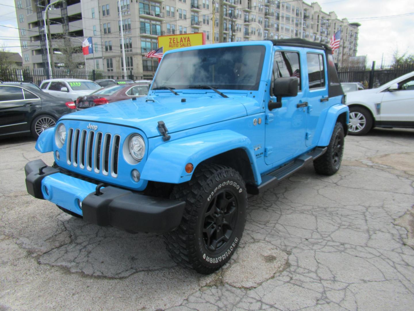 2017 BLUE /Black Jeep Wrangler Unlimited Sahara 4WD (1C4BJWEG1HL) with an 3.6L V6 DOHC 24V FFV engine, Automatic transmission, located at 1511 North Shepherd Dr., Houston, TX, 77008, (281) 657-1221, 29.798361, -95.412560 - 2017 JEEP WRANGLER UNLIMITED SAHARA VIN: 1C4BJWEG1HL571389 1 C 4 B J W E G 1 H L 5 7 1 3 8 9 4 DOOR WAGON/SPORT UTILITY 3.6L V6 F DOHC 24V GASOLINE REAR WHEEL DRIVE W/ 4X4 - Photo#14