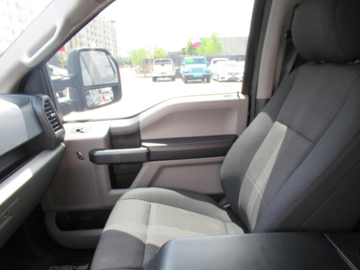 2020 Black /Black Ford F-150 King-Ranch SuperCrew 5.5-ft. 2WD (1FTEW1CP4LK) with an 2.7L V6 DOHC 24V engine, 6A transmission, located at 1511 North Shepherd Dr., Houston, TX, 77008, (281) 657-1221, 29.798361, -95.412560 - 155,141 mi VIN: 1FTEW1CP4LKD56074 Vehicle Details Crew Pickup 2.7L V6 F DOHC 24V Gasoline Rear wheel drive - Photo#6